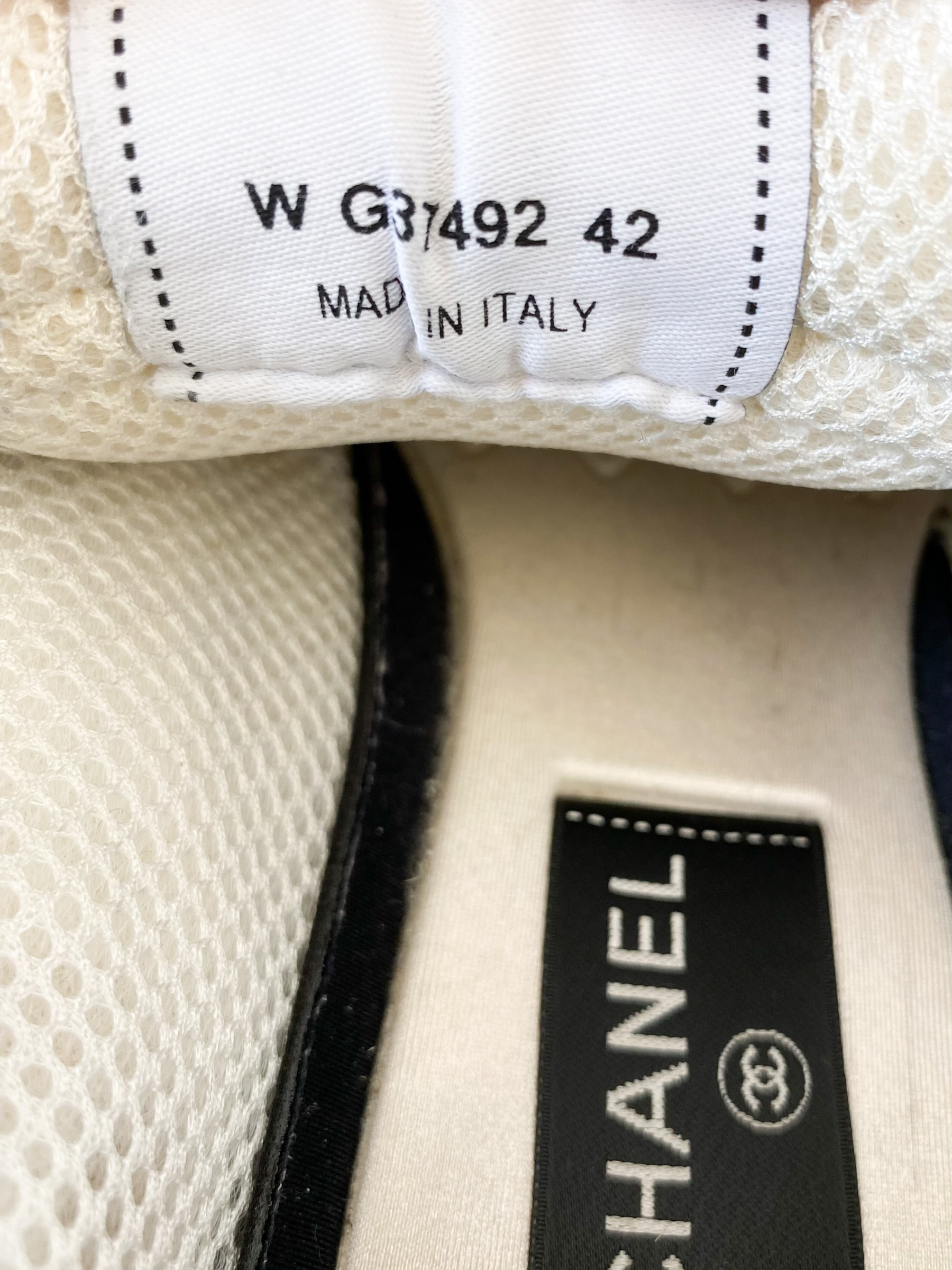 Chanel White & Black Interlock Logo Running Shoes - Women's Luxury Sneakers for Casual Wear & Street Style Fashion