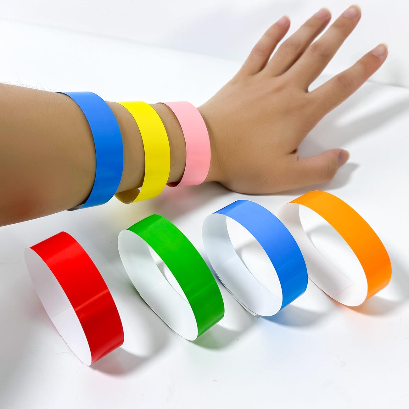 600 Count Neon Yellow Disposable Paper Wristbands - Tearproof & Waterproof Party Wrist Bands for Events, Concerts, Festivals and Clubs - Bulk Adhesive Bracelets for Entry Control and Crowd Management