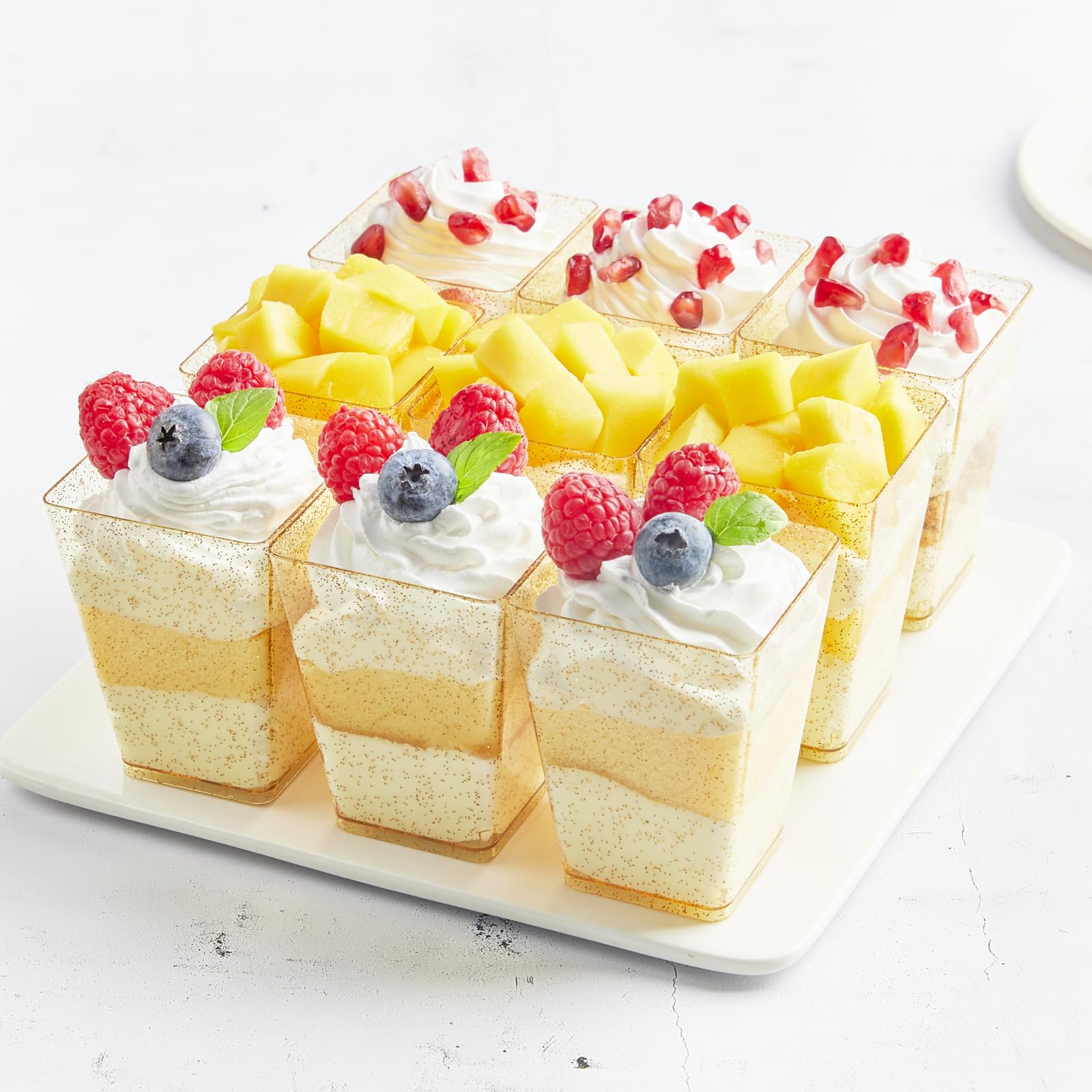 Qeirudu 50-Pack 5 oz Gold Glitter Mini Dessert Cups with Spoons - Square Plastic Parfait & Shooter Cups for Party Serving, Pudding, Cheesecake, Mousse, Jello - Perfect for Weddings, Baby Showers & Birthday Celebrations