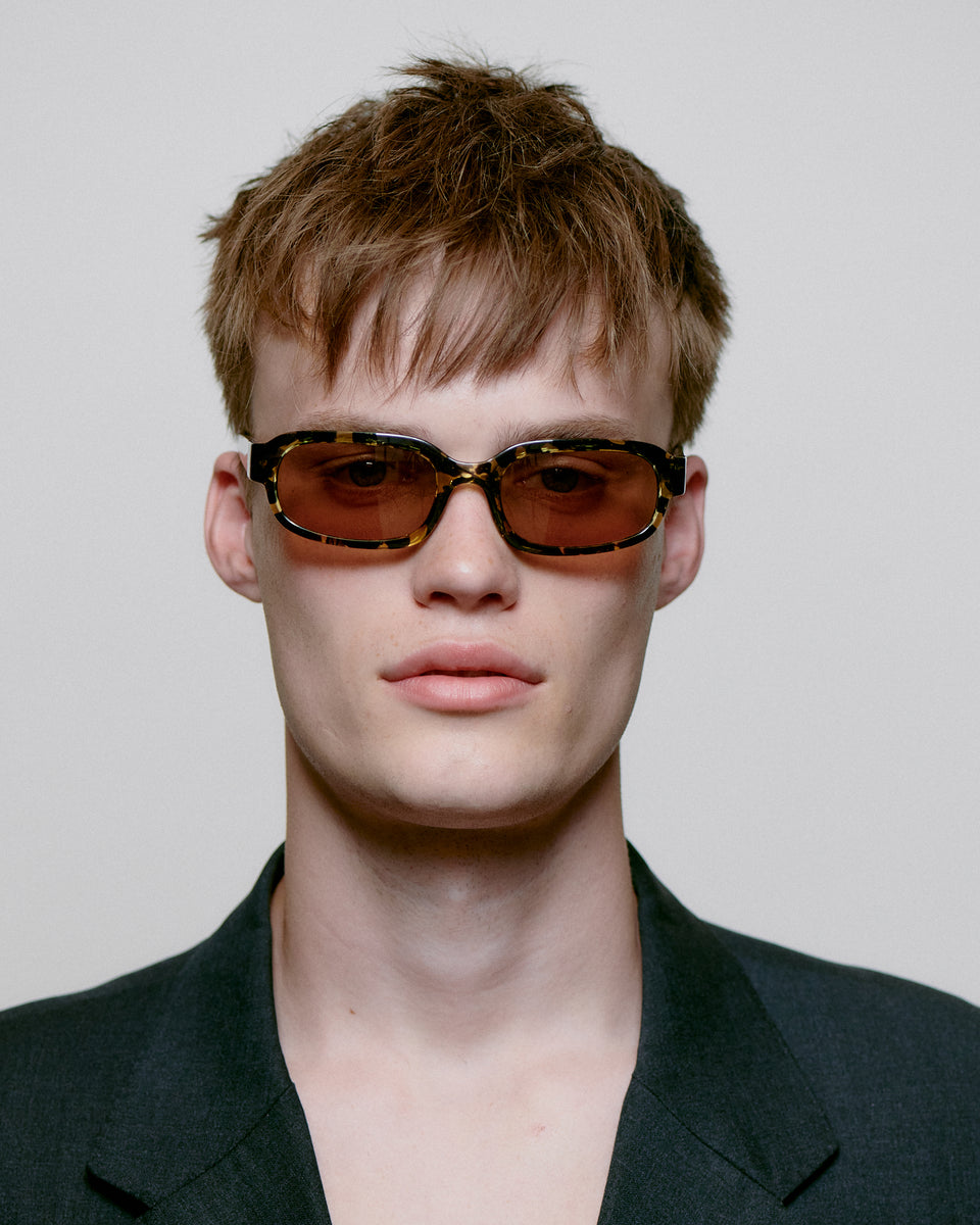 A. Kjaerbede Black/Yellow Tortoise Sunglasses - Stylish UV Protection for Outdoor Activities & Fashion