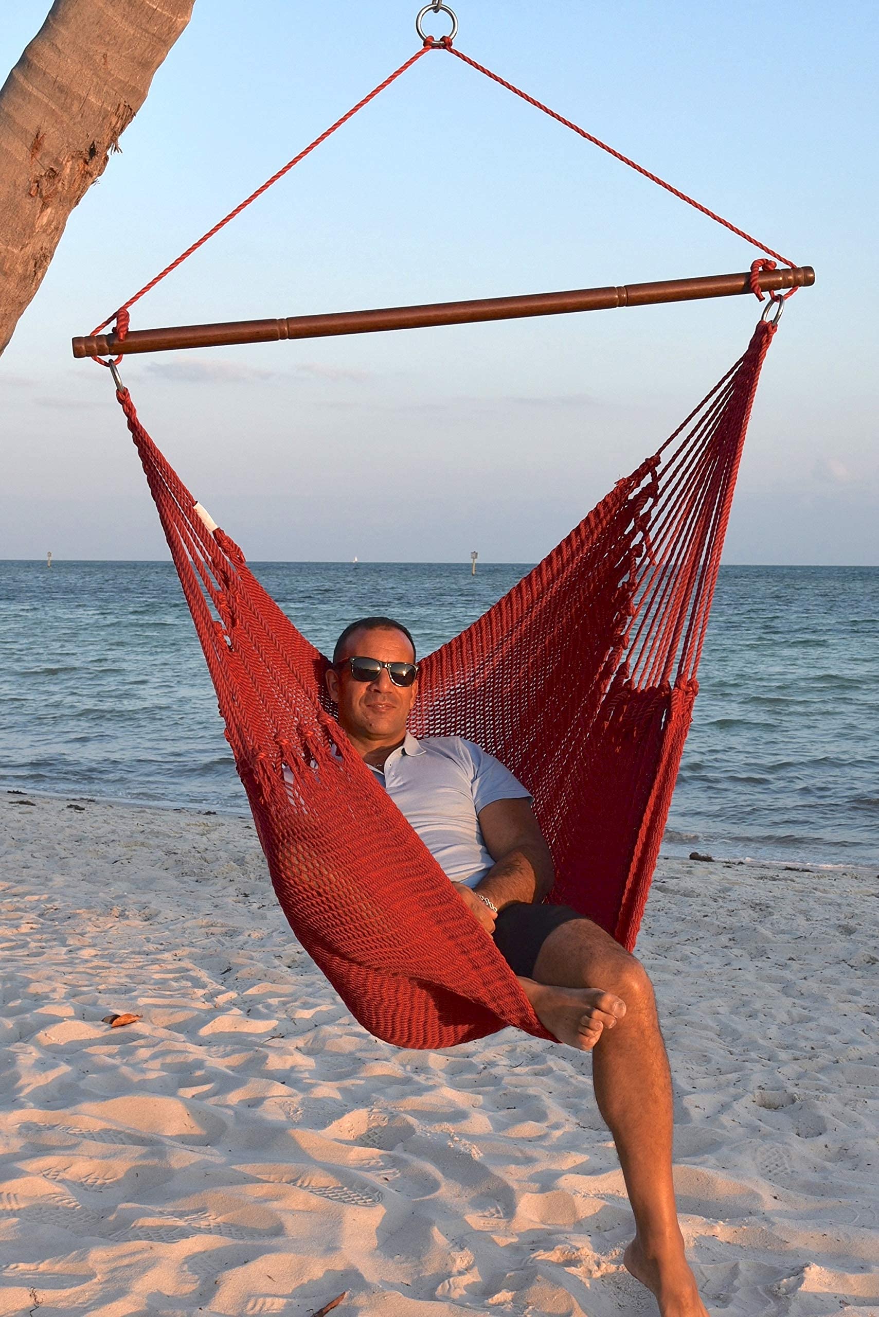 Jumbo Caribbean Hammock Chair with Footrest - 55 Inch Oversized Hanging Swing Chair - Soft-Spun Polyester Fabric - Red Relaxation Chair for Indoor/Outdoor Use - Perfect for Patio, Garden, Balcony & Backyard Lounging