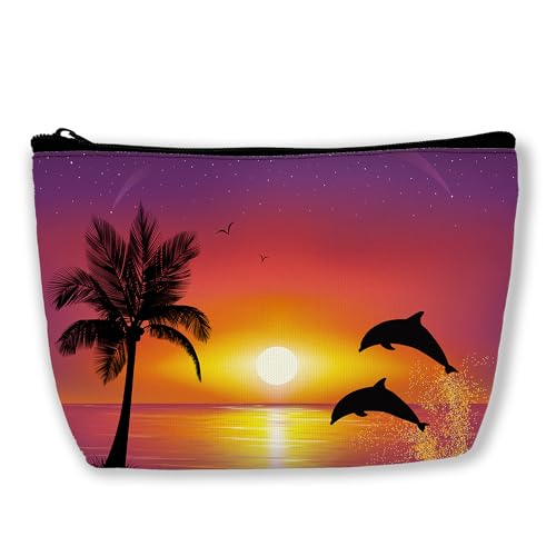dolphins jumping and palm tree sunset