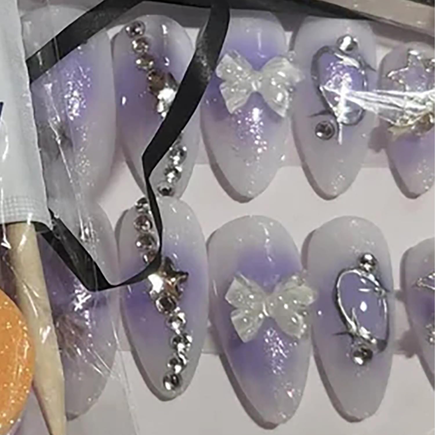 Purple Press on Nails - Almond Fake Nails with Glitter Rhinestones & 3D White Bow Design | Y2K Silver Chrome Nails for Women | Perfect for Parties, Weddings, and Special Occasions