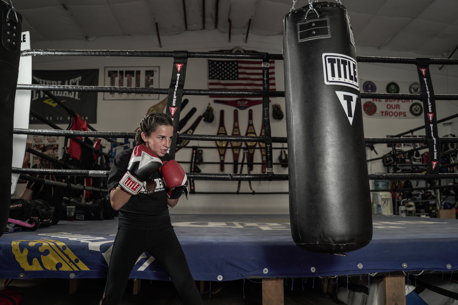 TITLE Boxing Professional Choice 125lb Synthetic Leather Heavy Punching Bag for Home Gym, MMA Training & Boxing Workouts