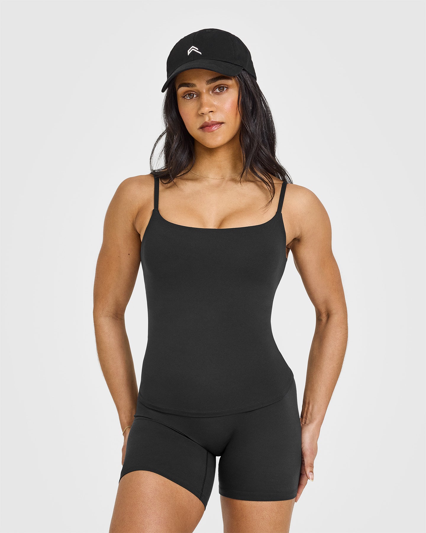SoftMotion™ Strappy Vest with Built-in Bra Shelf | Soft Black | Comfortable Workout Top for Yoga, Running & Gym