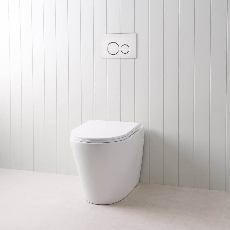 Angled In-Wall Toilet with Round Chrome Buttons - Modern Space-Saving Bathroom Solution for Small Spaces & Contemporary Homes