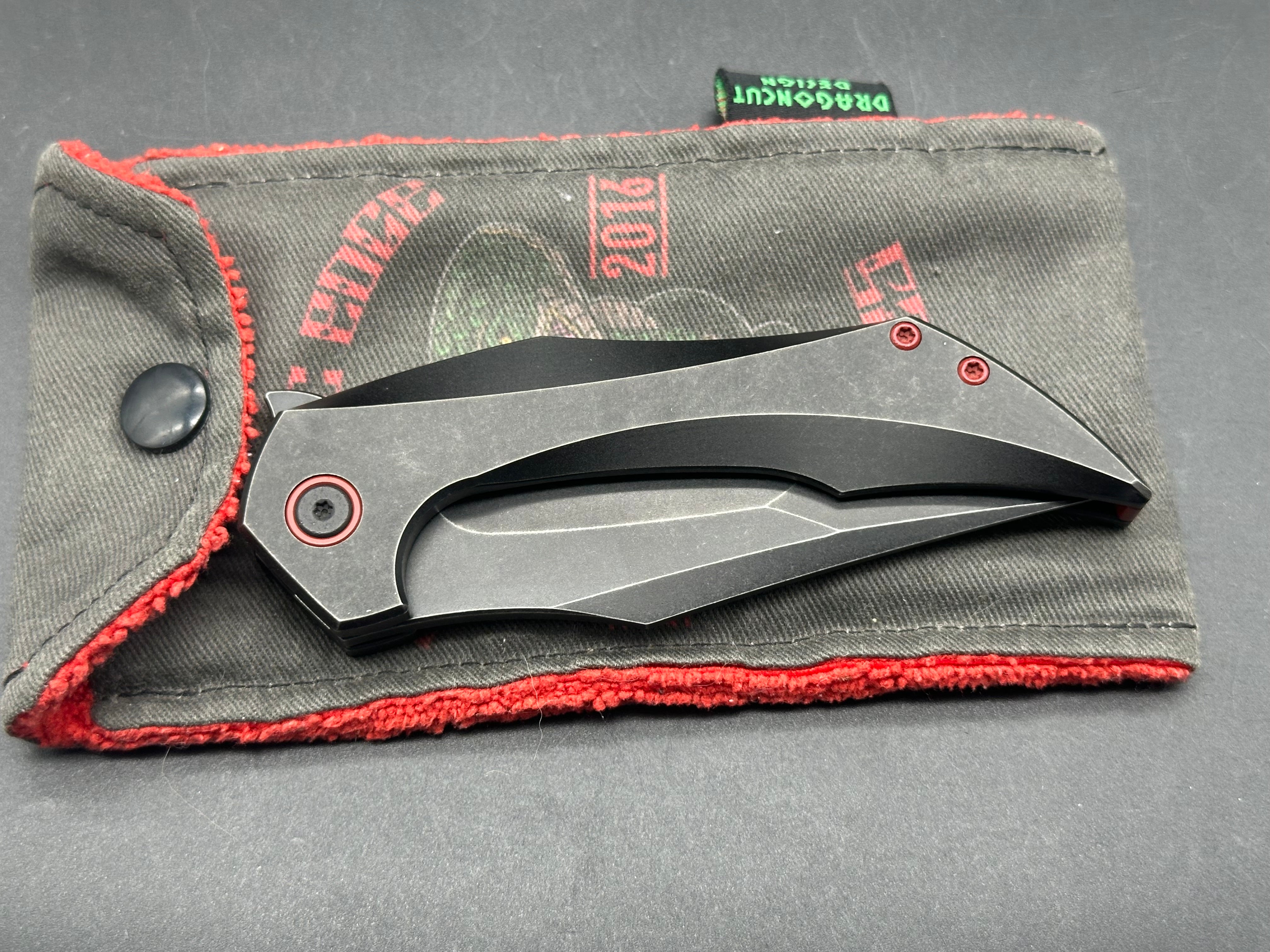 Fanatic Edge Omen Black Milled Titanium Handle Knife with Red Hardware & Clip Point Tanto Blade - Bohler M390 Steel - EDC, Camping, Survival, Outdoor Activities