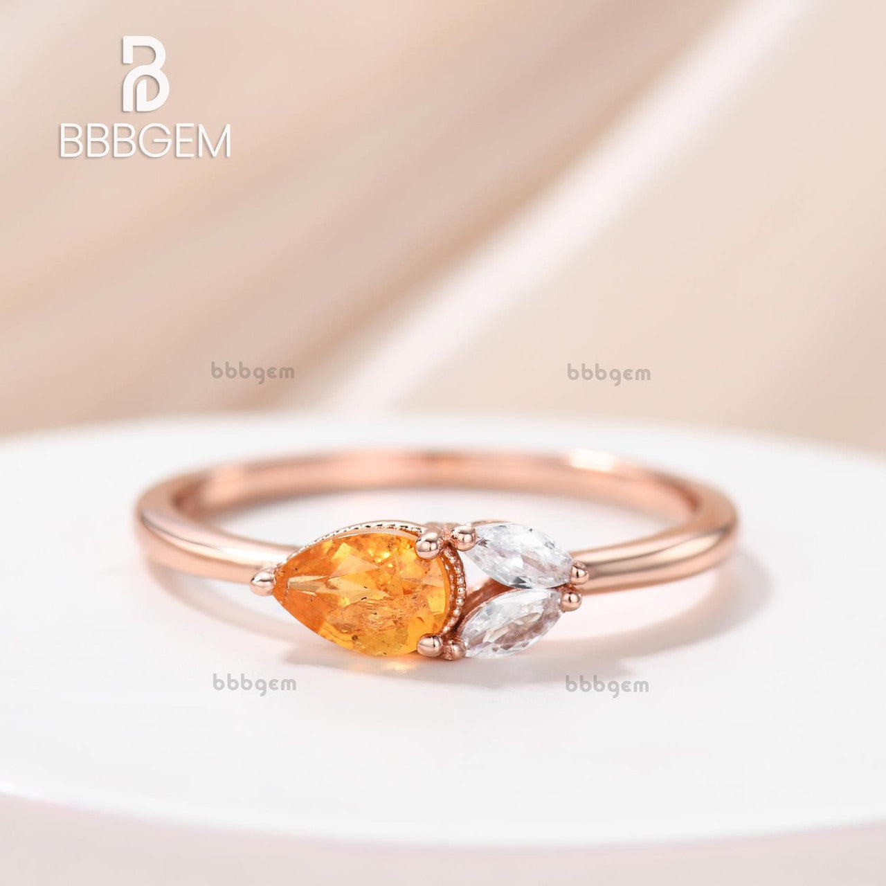 Exquisite East West Pear Shaped Spessartite Garnet Ring with Moissanite Accents - Basket Setting for Engagement, Anniversary & Special Occasions