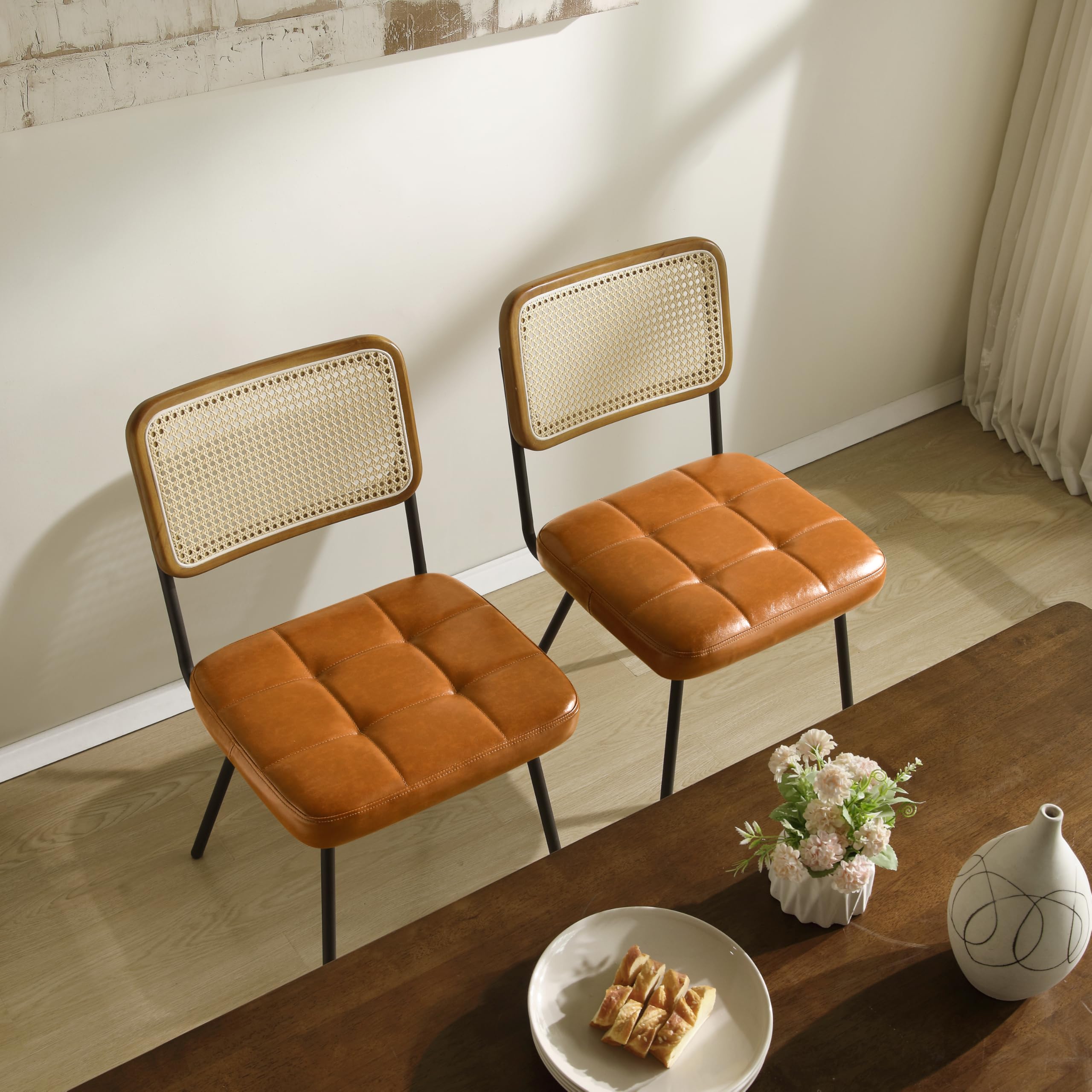 Art Leon Rattan Dining Chairs Set of 2 - Mid Century Modern Kitchen & Dining Room Chairs with Woven Rattan Back, Faux Leather Seat & Black Metal Legs - Sturdy Rubber Wood Frame in Yellow Brown - Perfect for Breakfast Nook, Bistro, Patio & Small Space Dining