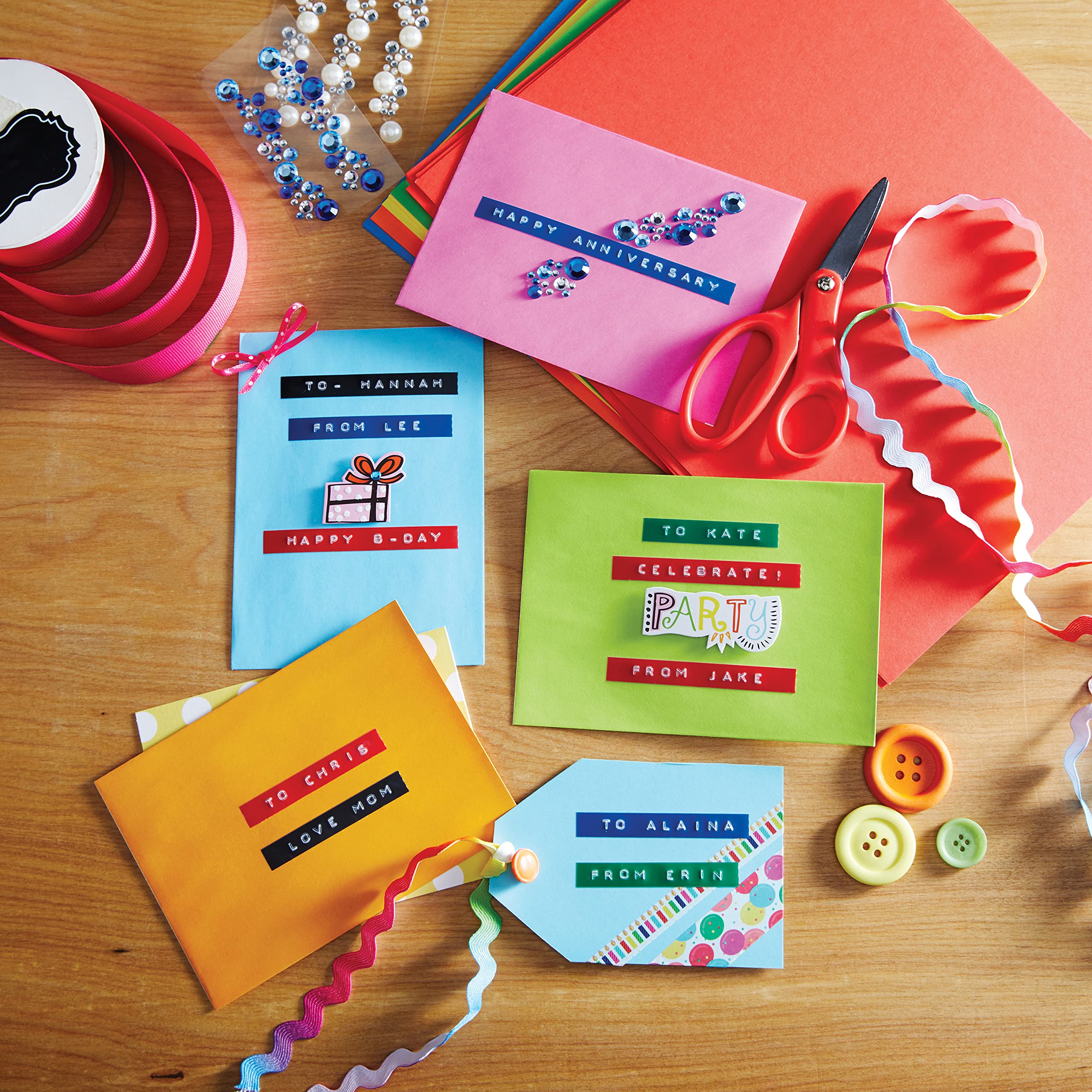 DYMO Embossing Label Maker Starter Kit with 3 Label Tapes - Compact & Ergonomic Design with Turn Click Wheel - Perfect for Home Organization, DIY Projects, Crafting & Office Use (Compatible with £/€, Ä, Ö & Ü Characters)