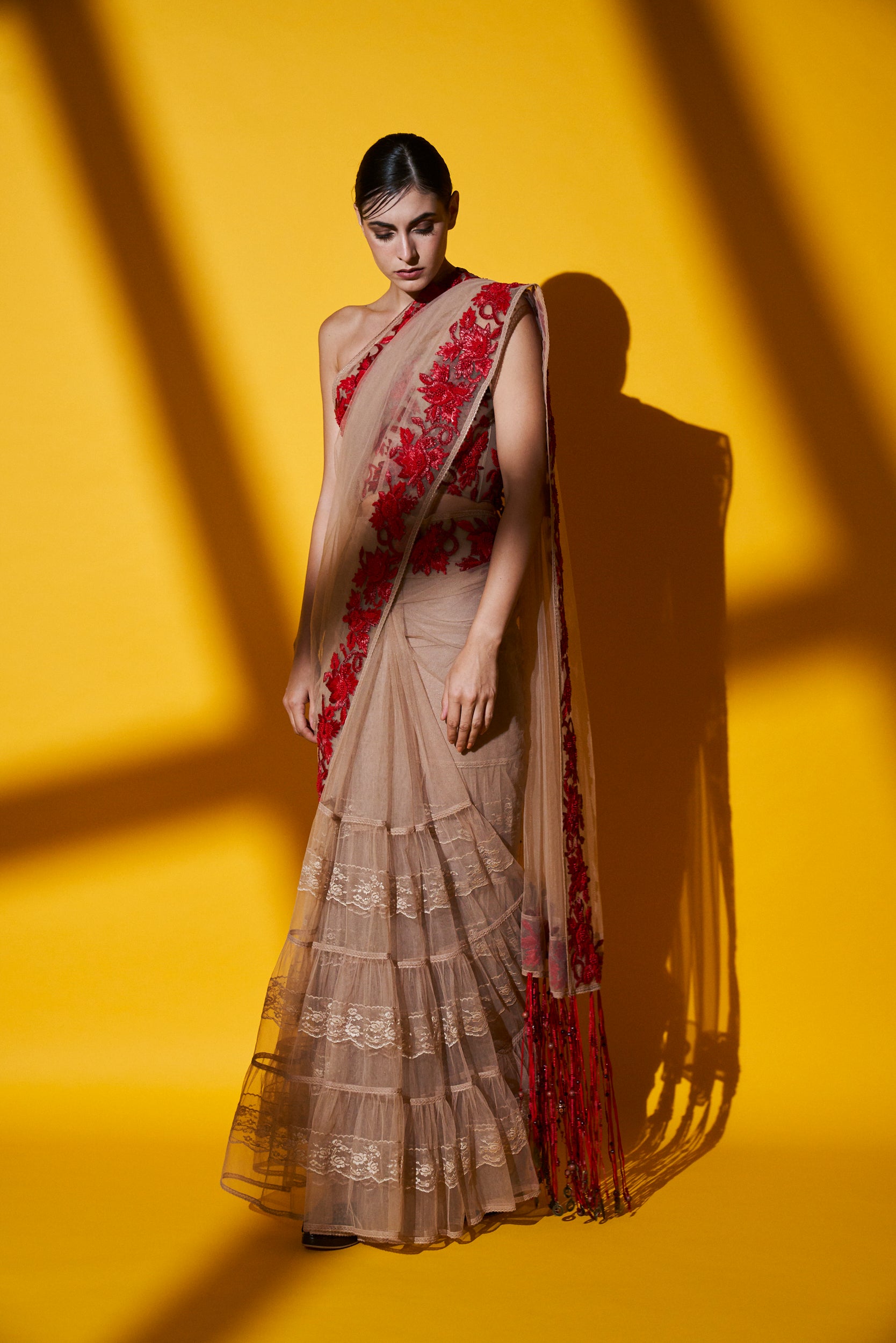 Elegant Blush Pink Pleated Saree with Corset Blouse & Red Raffia Embroidery - Perfect for Weddings, Parties and Special Occasions