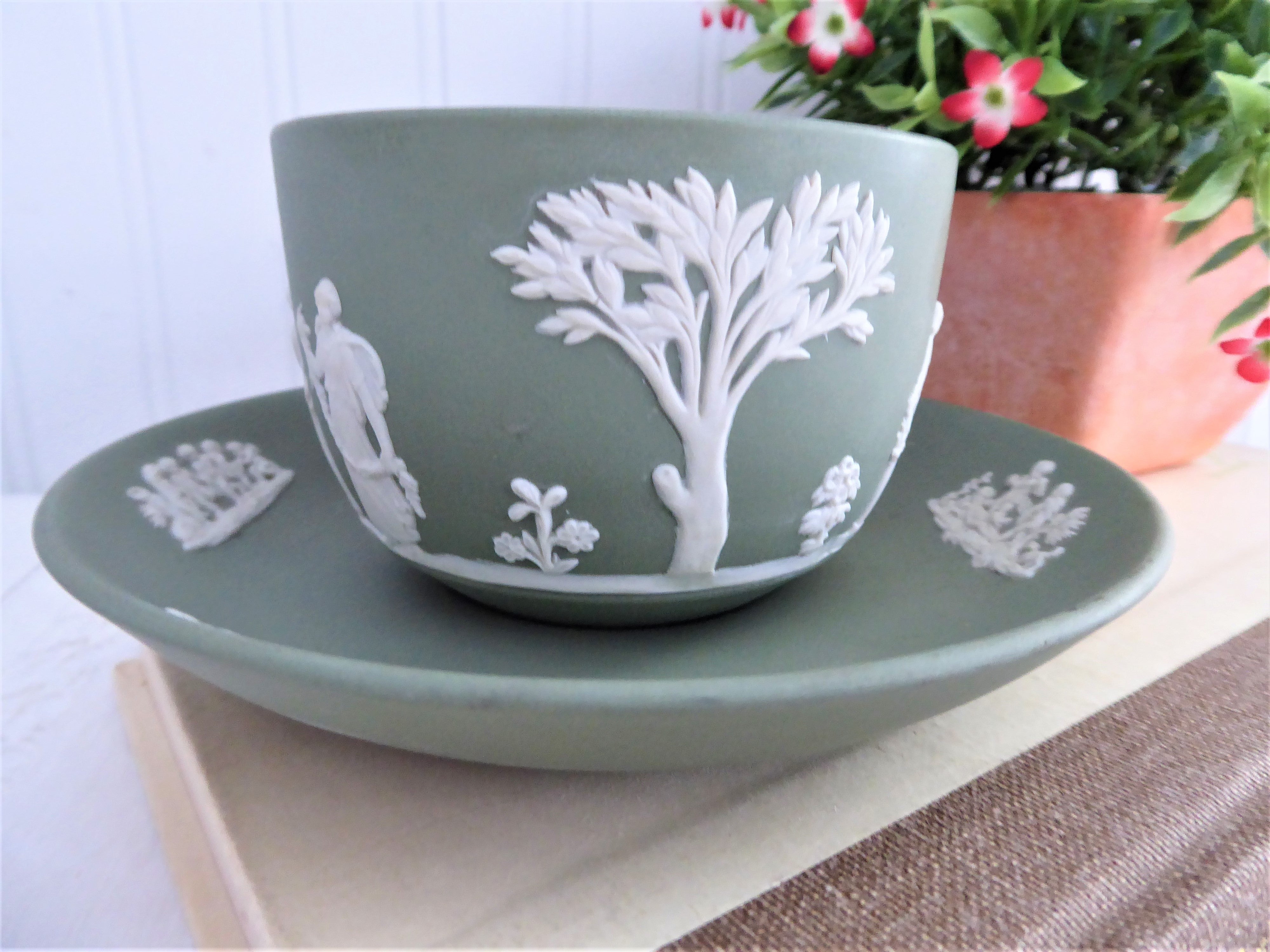 Vintage Wedgwood Green Jasperware Cup and Saucer Set with Cherub Sacrifice Figures - Made in England 1970s - Perfect for Tea Time, Collectible Display, and Wedgwood Enthusiasts