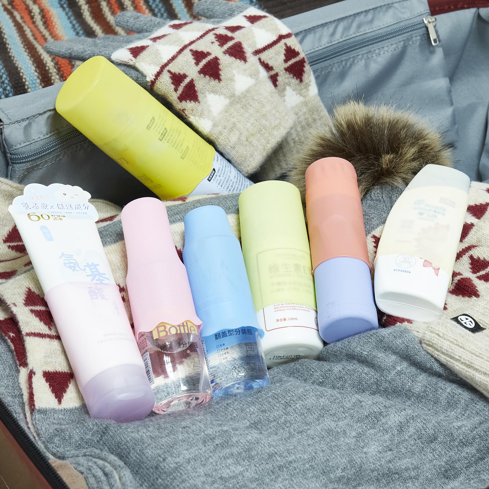 8 Pack Silicone Travel Bottle Covers - Stretchable Container Sleeves for Shampoo, Lotion & Toiletries (Blue/Black/White/Pink) - Perfect for Air Travel, Gym & Vacation Essentials