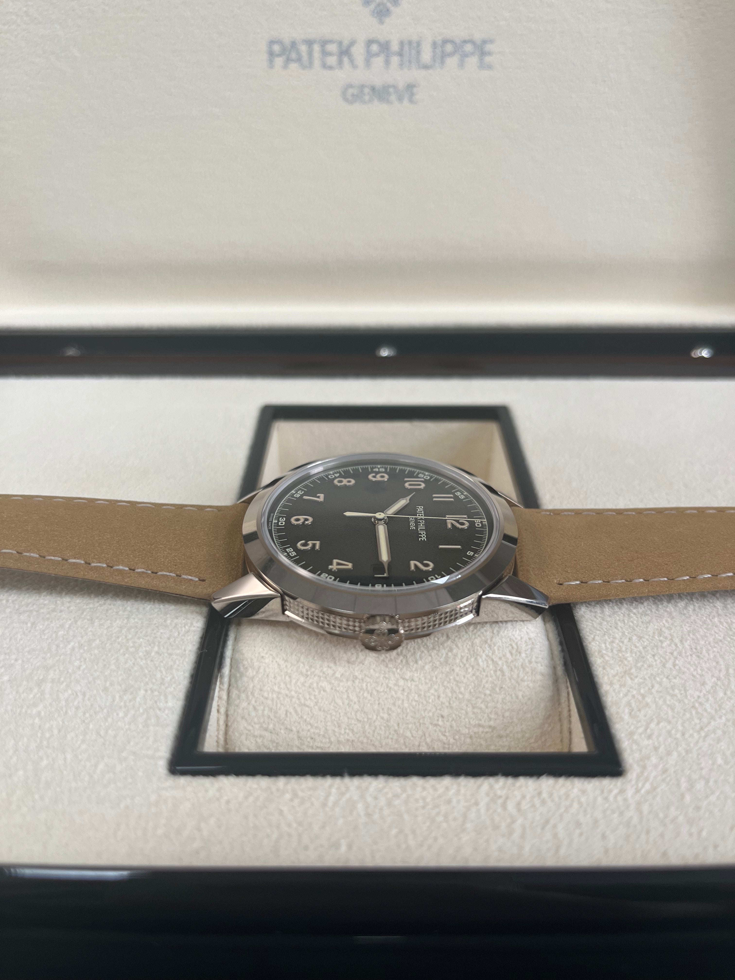 Patek Philippe Calatrava 5226G-001 40mm Men's Luxury Watch - 18K White Gold Case with Textured Dial - Perfect for Business Meetings & Formal Occasions