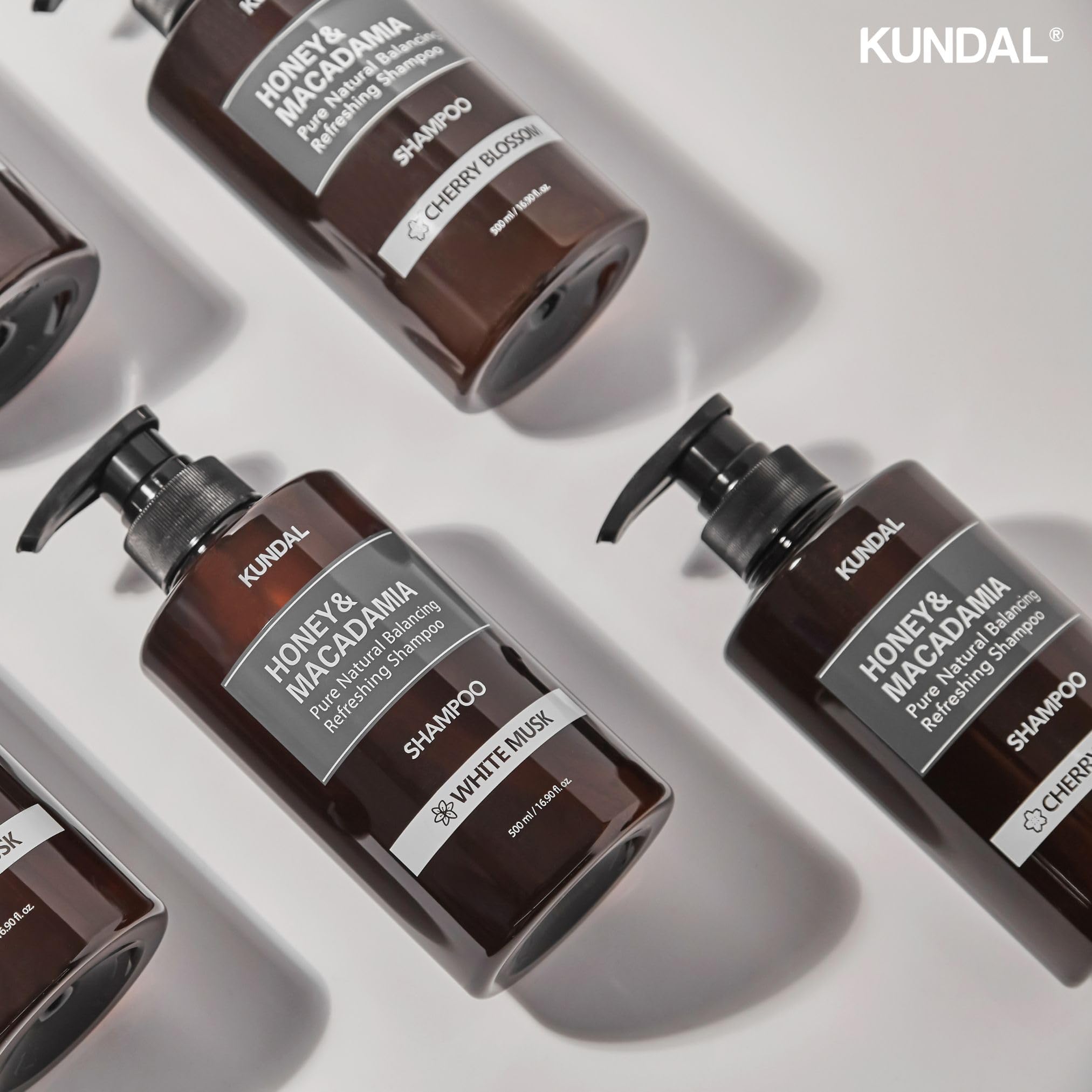 KUNDAL Natural Shampoo and Conditioner Set with Baby Powder Scent - Korean Hair Care for Moisturizing, Nourishing & Frizz Control | Sulfate-Free with Argan & Macadamia Oil (16.9 fl oz, Pack of 2) | Perfect for Dry, Damaged Hair & Daily Hair Care Routine