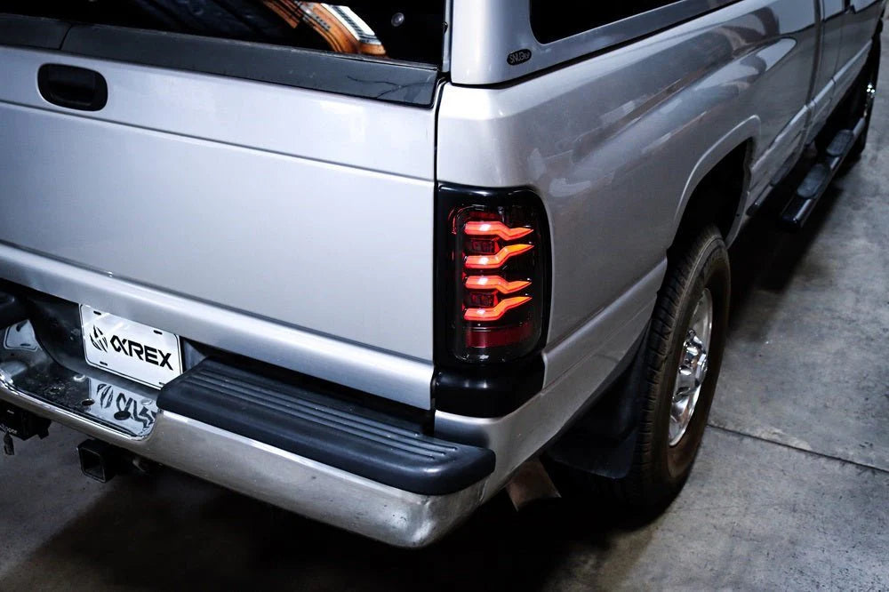 AlphaRex LUXX LED Tail Lights for Dodge Ram 1500 (1994-2001) & 2500/3500 (1994-2002) - Black Smoke Style - High Visibility & Durable Replacement Lights - Perfect for Night Driving & Off-Road Adventures