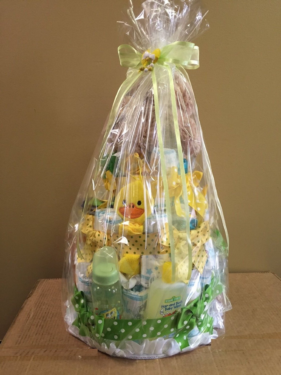 Beautiful Yellow & Green Baby Diaper Cake with Essential Newborn Supplies - Perfect for Baby Showers, Gender Reveals & Nursery Decor