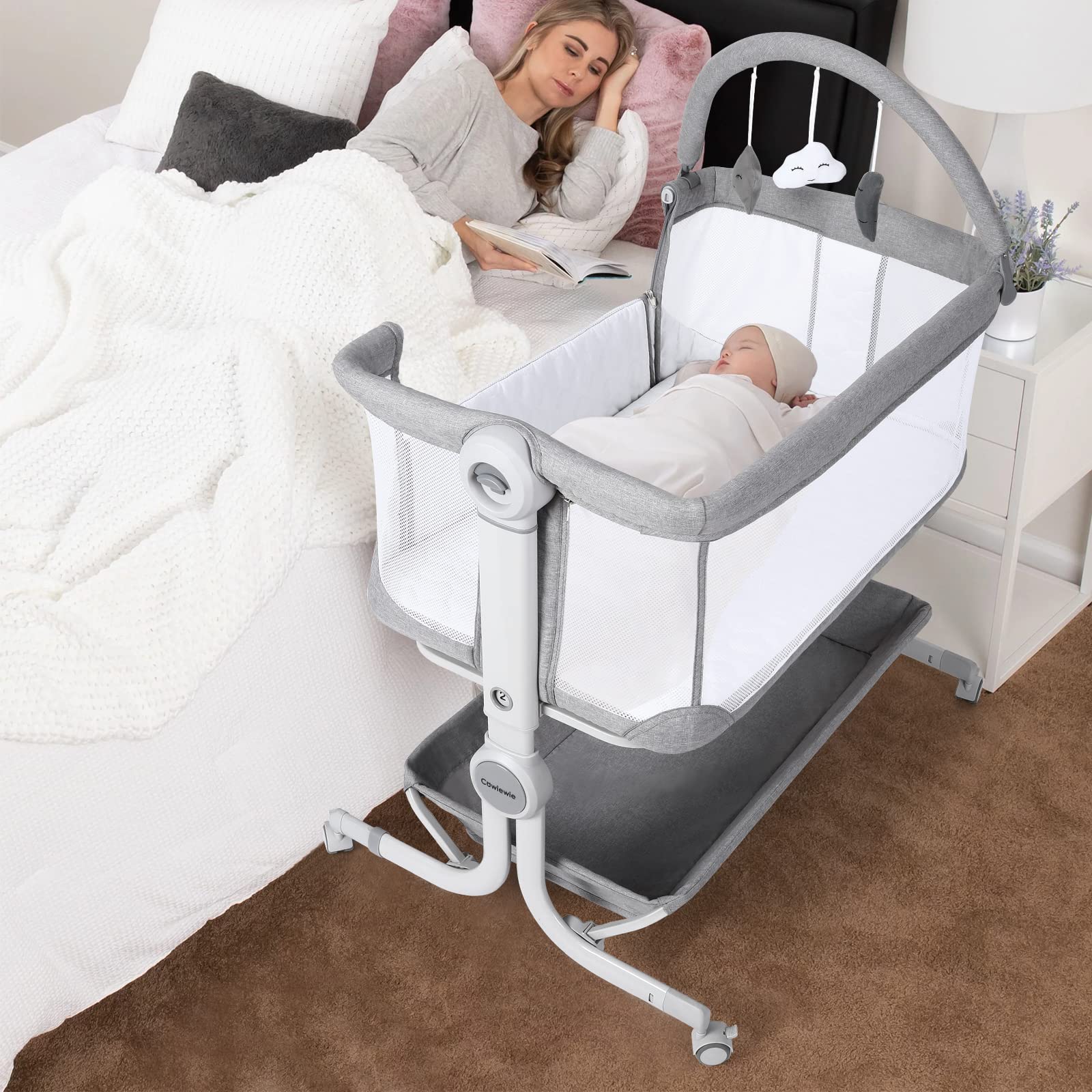 Cowiewie Portable Baby Bassinet Bedside Sleeper - Adjustable Height, Foldable Design with Wheels, Storage Basket & Hanging Toys - Safe Newborn Crib for Nursery, Bedroom & Travel (Handbag Style)