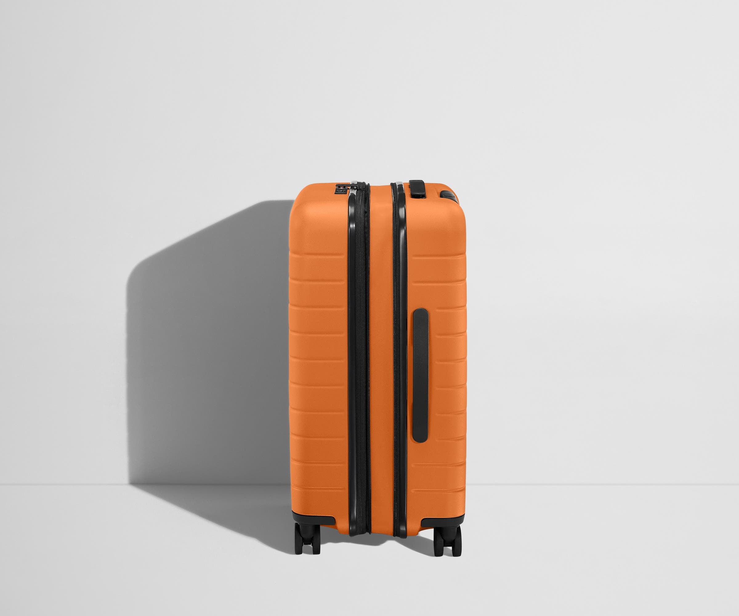 The Bigger Carry On Flex Suitcase in Sorbet Orange - Lightweight Expandable Luggage for Travel, Business Trips & Weekend Getaways