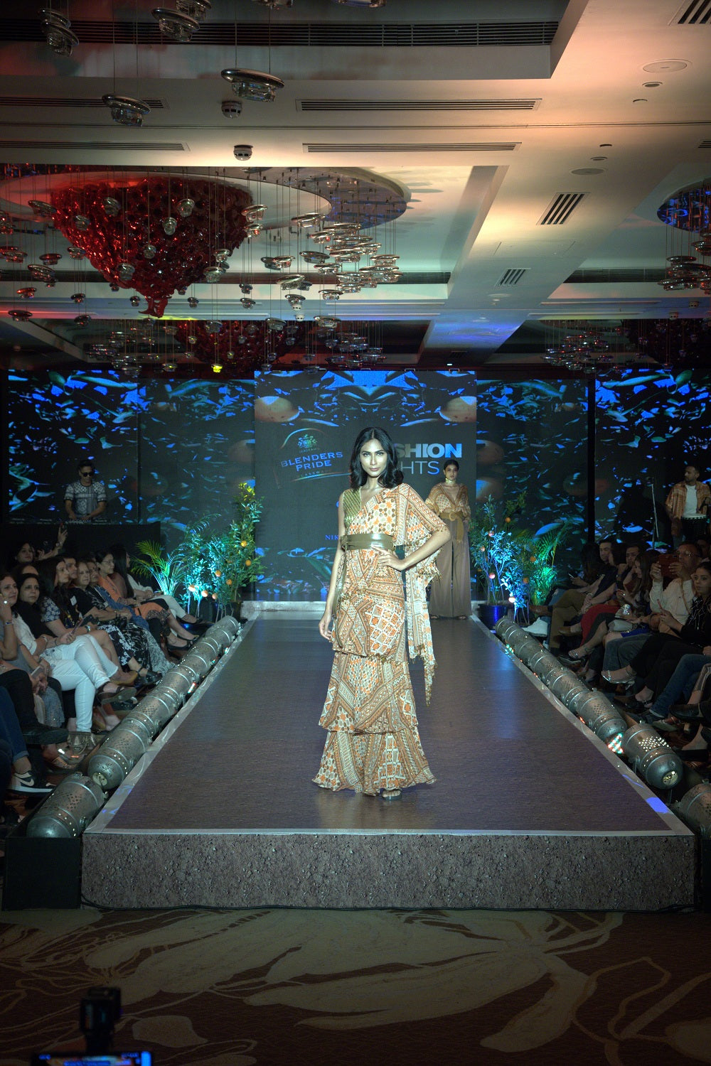 Stylish Tangerine Tribal Print Lurex Ruffle Saree with Matching Blouse - Perfect for Diwali, Weddings & Special Occasions