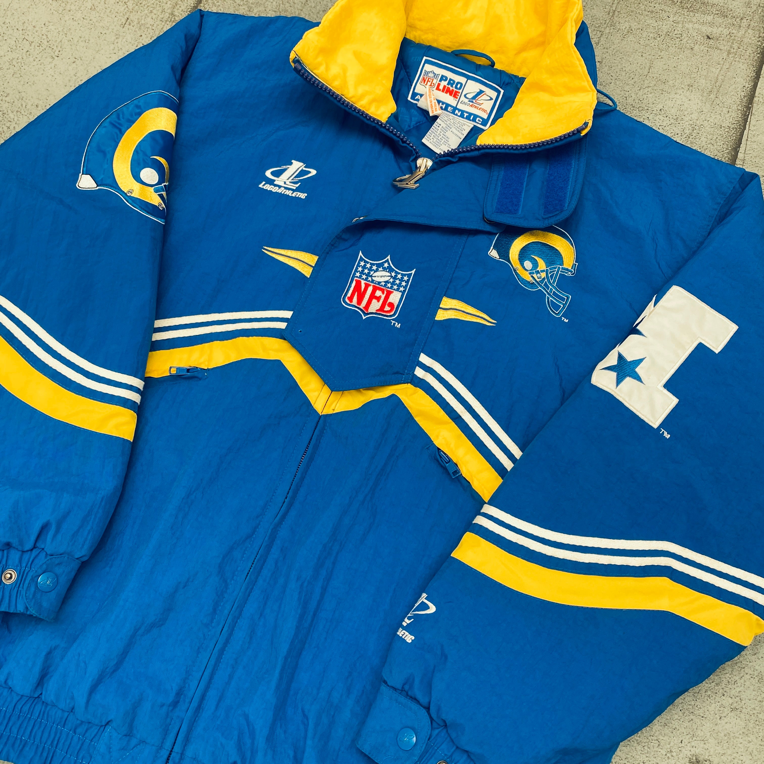 Vintage St. Louis Rams 1990s Logo Athletic Full-Zip Diamond Spike Jacket - Proline NFL Football Team Apparel (Medium/Large) - Perfect for Game Day, Tailgating & Sports Fan Collectibles