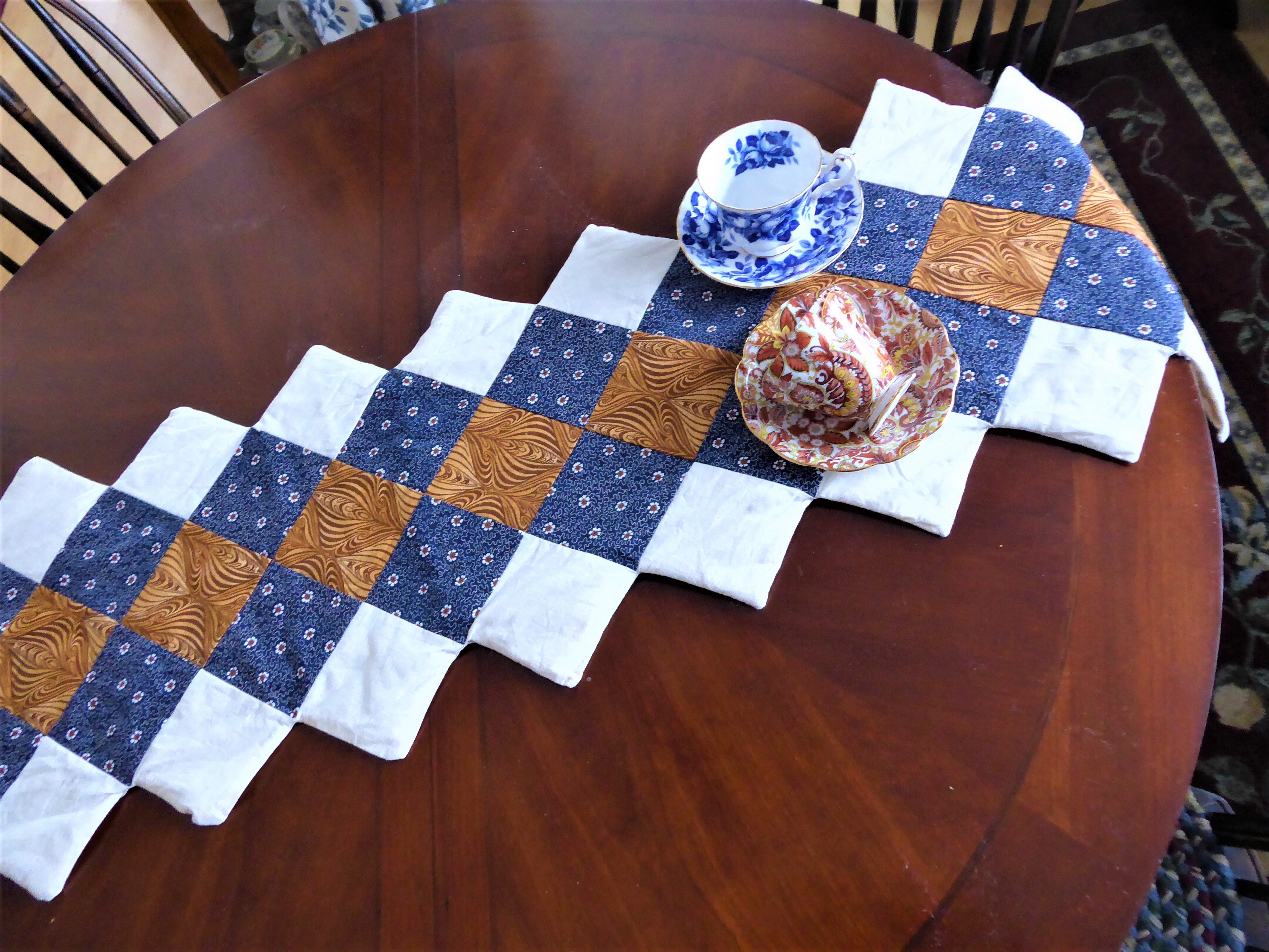 Handmade Patchwork Table Runner - Blue, White & Brown Squares with Toothed Edge - Unfinished Cotton Fabric - Perfect for Farmhouse, Rustic & Boho Home Decor - Dining Table, Coffee Table & Buffet Decorations