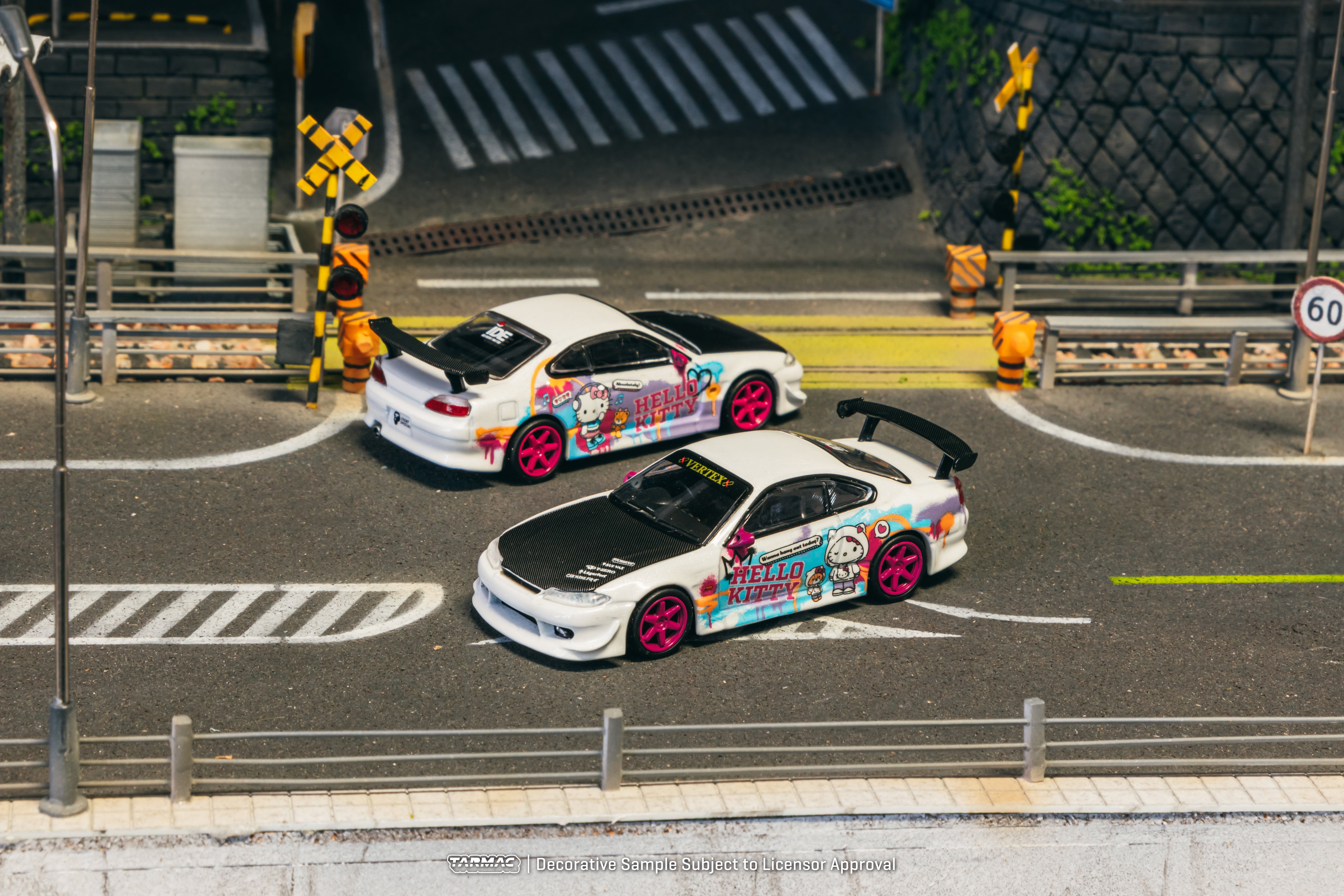 Tarmac Works 1/64 Scale VERTEX Nissan Silvia S15 Hello Kitty Drift Car - IDE Special Edition Diecast Model for Collectors - Perfect for Display, Racing Enthusiasts, and Gift Giving