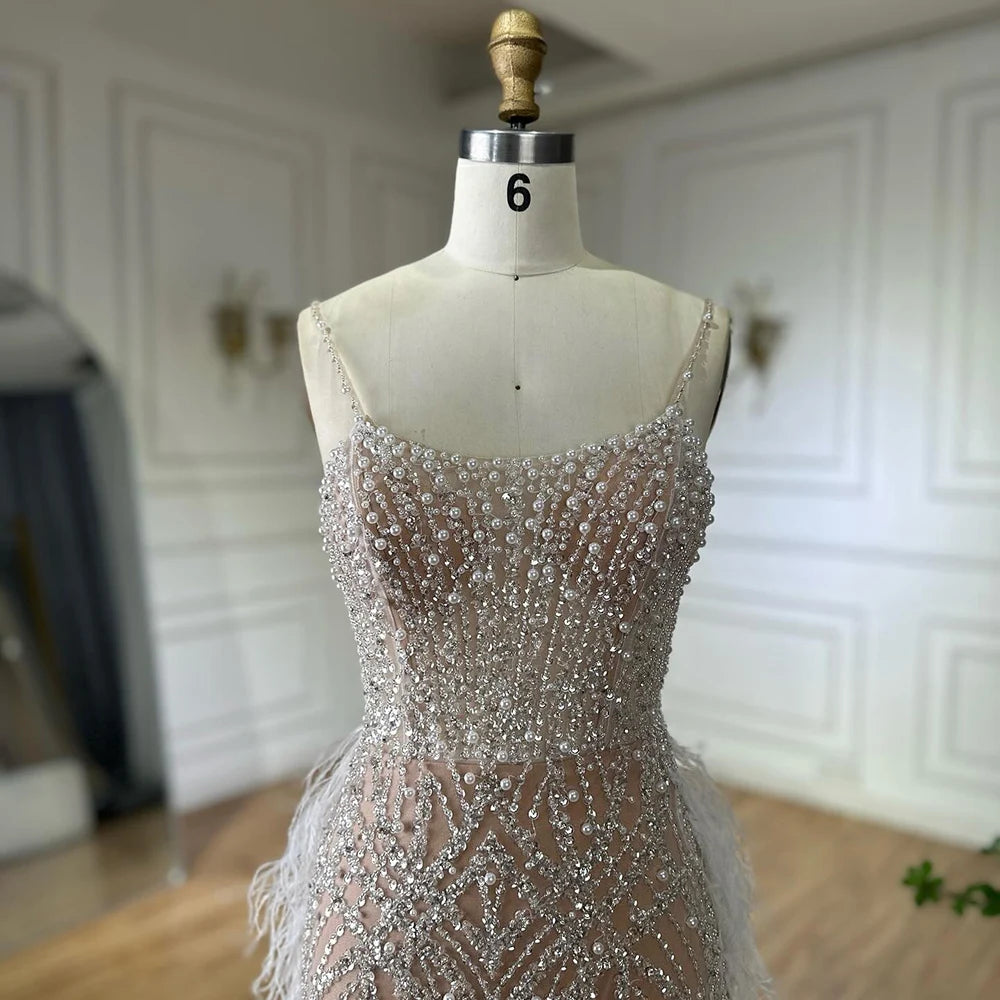 Elegant Dubai Arabic White Nude Spaghetti Strap Feather Beaded Mermaid Evening Gown - Formal Party Dress for Weddings, Galas & Red Carpet Events LA72823