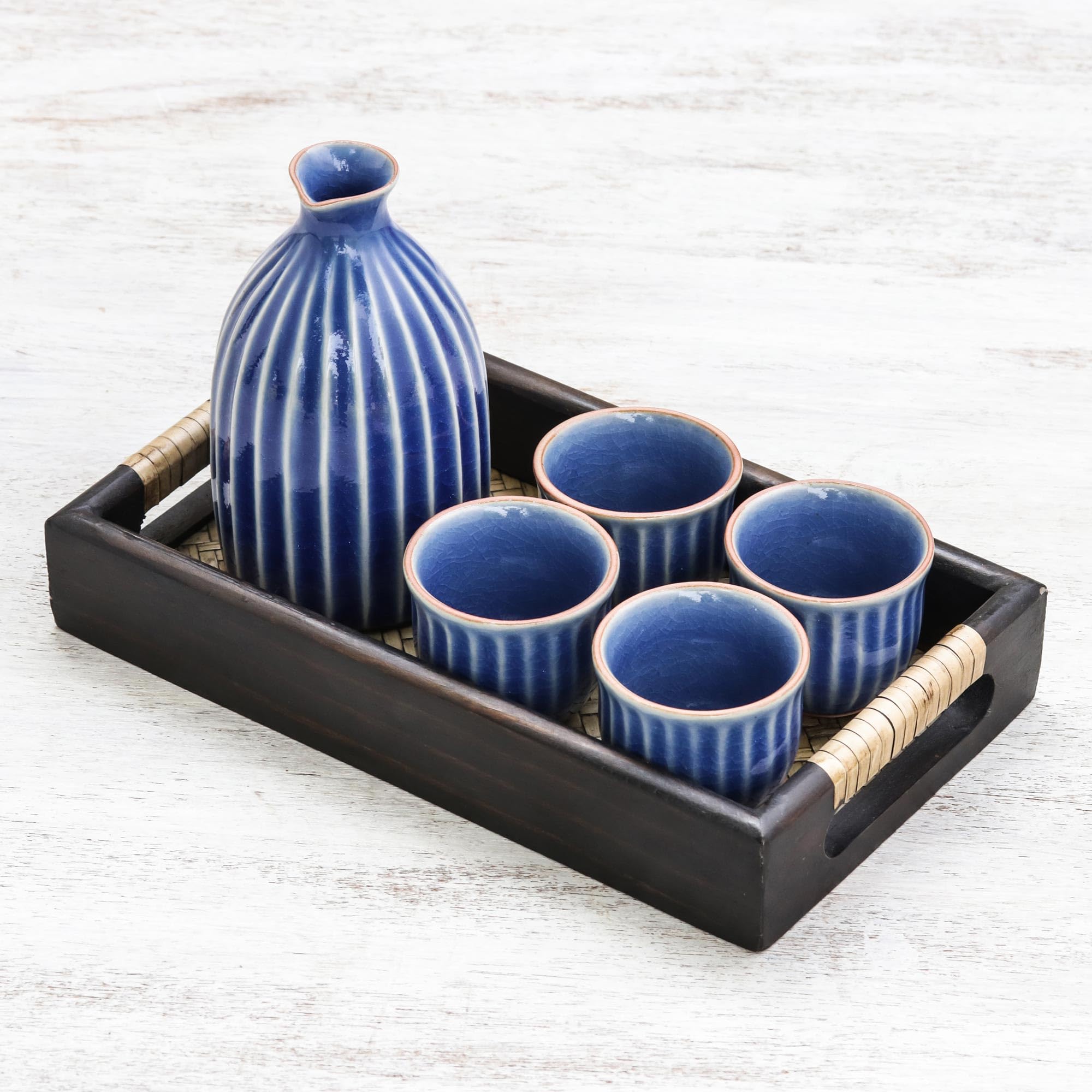 NOVICA Handmade Celadon Ceramic Sake Set - Blue Japanese Style Decanter with 4 Cups & Wood Tray - Traditional Thai Tableware for Sake, Wine & Tea - Perfect for Dinner Parties, Gifts & Home Decor (Decanter 5.5