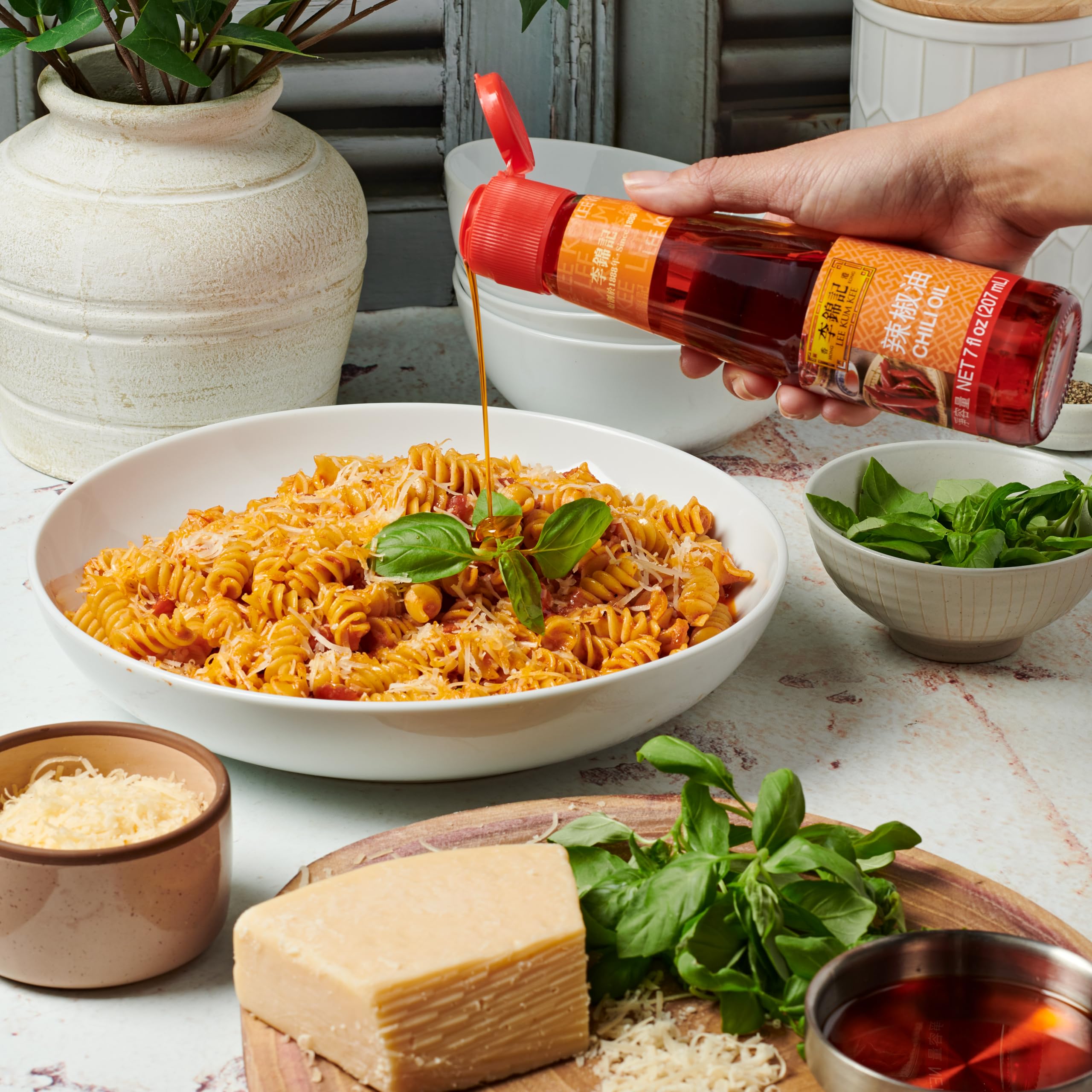 Lee Kum Kee Chili Oil 7 oz - Premium Spicy Chili Oil Made with Dried Chili Peppers & Soybean Oil - Hot Sauce for Dipping, Cold Dishes, Sichuan & Hunan Cuisine - Perfect for Noodles, Dumplings & Stir-Fry