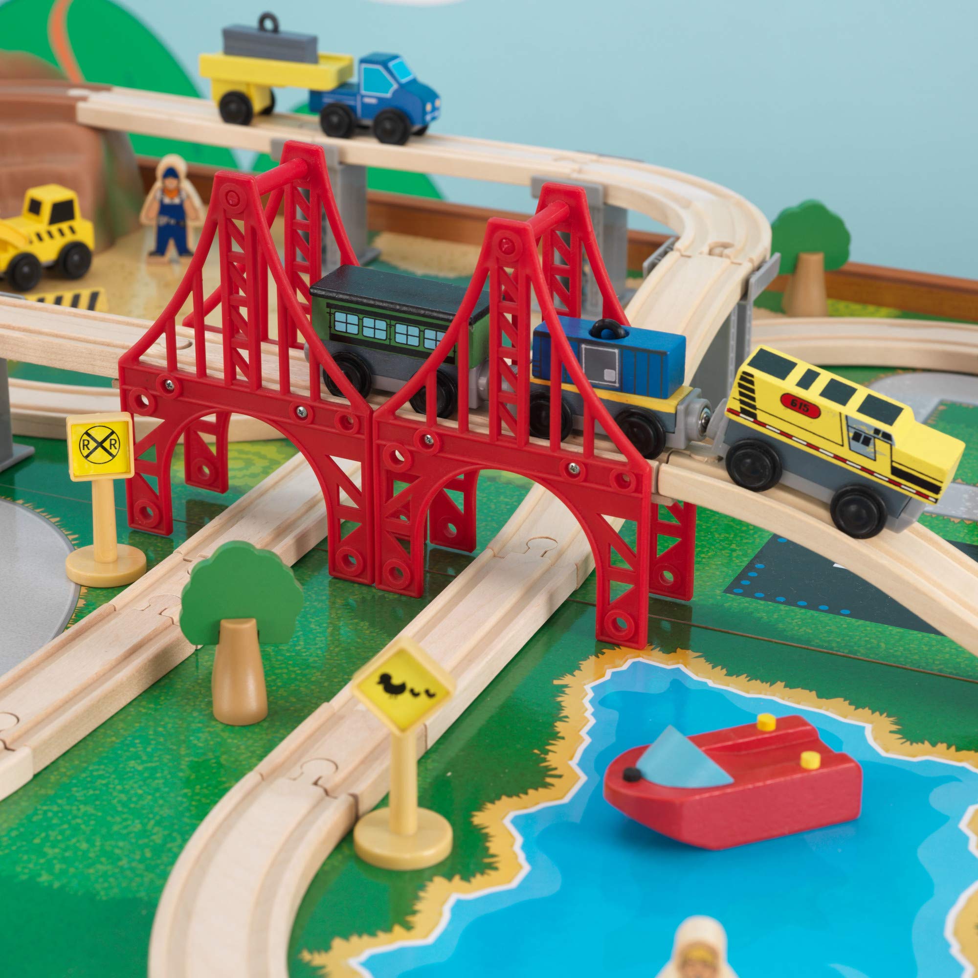 KidKraft Ride Around Town Wooden Train Set with Table - 100-Piece Playset Includes Helicopter, Airplane & Farm Accessories - Storage Bins & Major Brand Compatibility - Perfect for Preschool Playrooms & Toddler Birthday Gifts (Honey Finish)