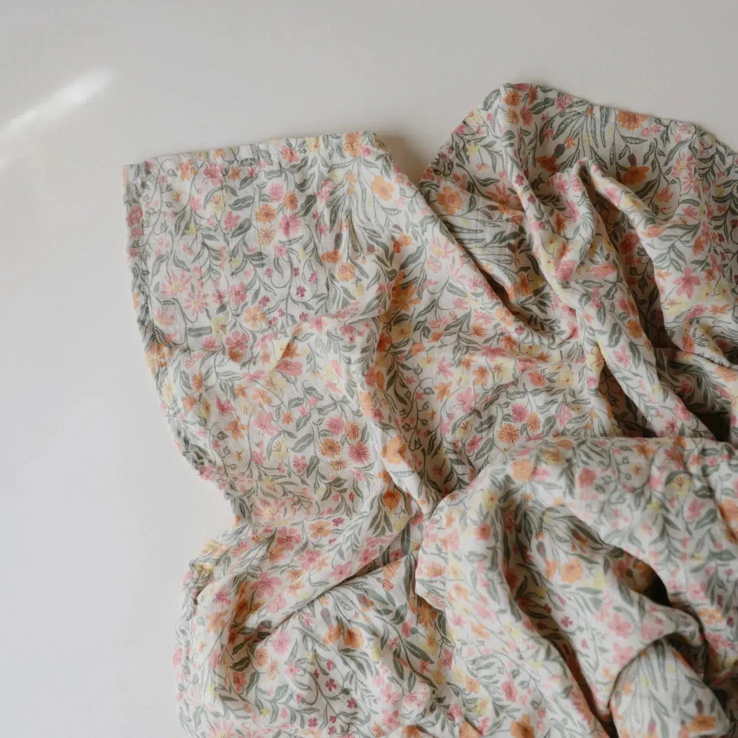 Mushie Organic Cotton Muslin Swaddle Blanket - Soft Baby Swaddle Wrap for Newborns & Infants, Breathable & Lightweight, Pastel Blooms Design - Perfect for Nursery, Swaddling, Stroller & Photo Shoots