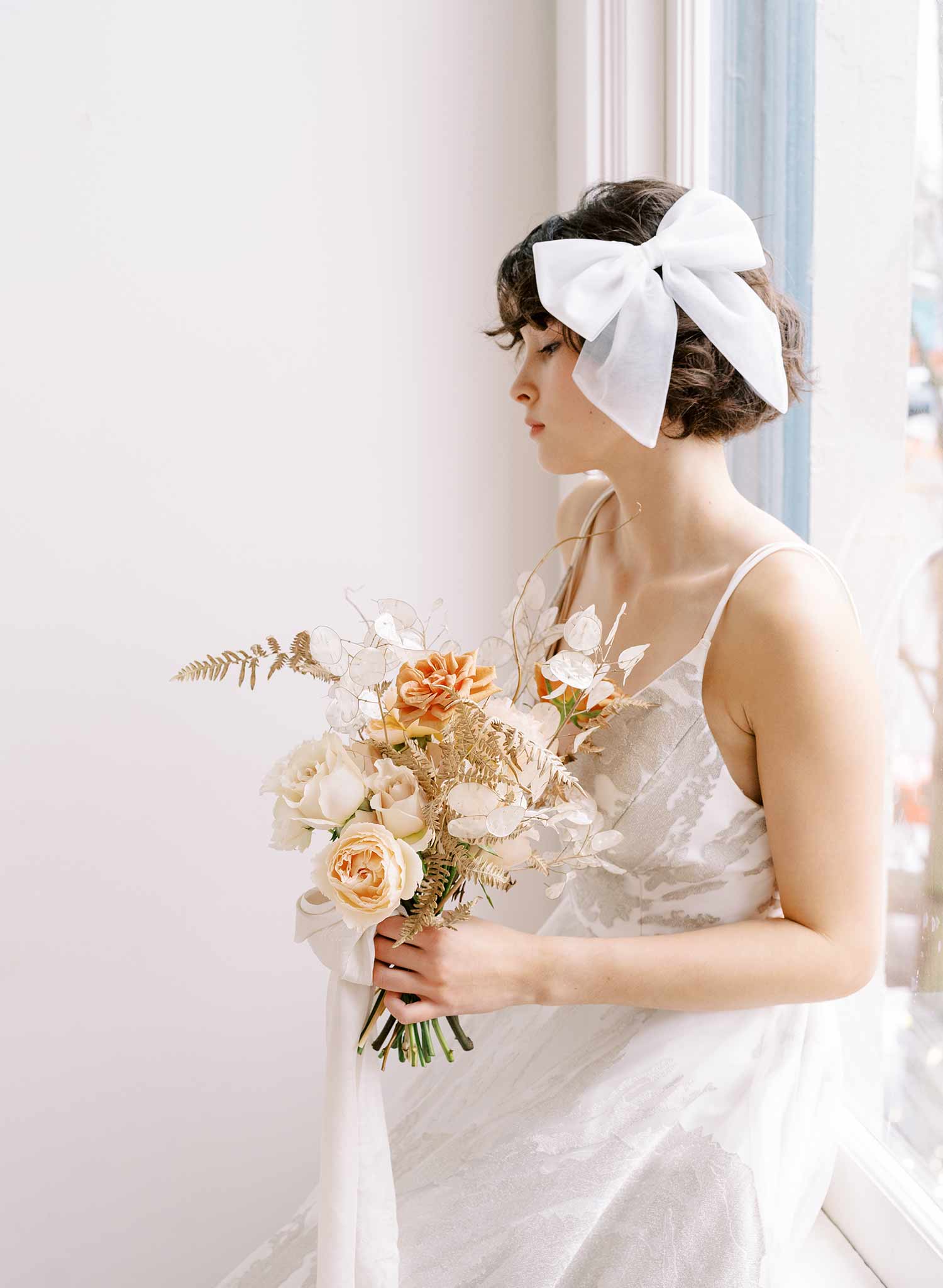 Elegant Tulle Bridal Bow Hair Clip - Style #2355 for Weddings, Prom & Special Occasions