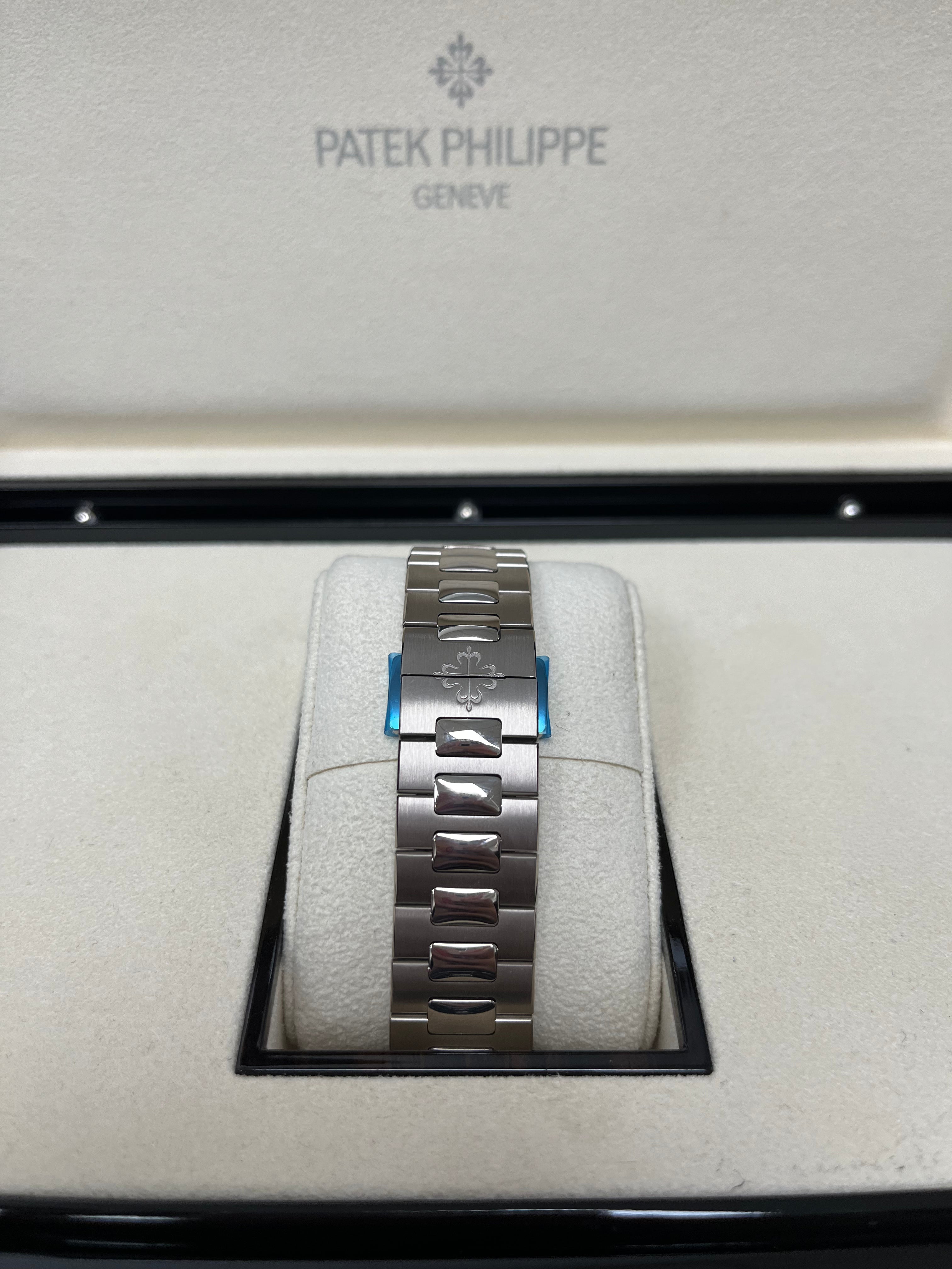 Patek Philippe Nautilus Perpetual Calendar Watch - 18K White Gold Case, Blue Sunburst Dial (Ref#5740/1G-001) | Luxury Swiss Timepiece for Men, Business Meetings & Special Occasions