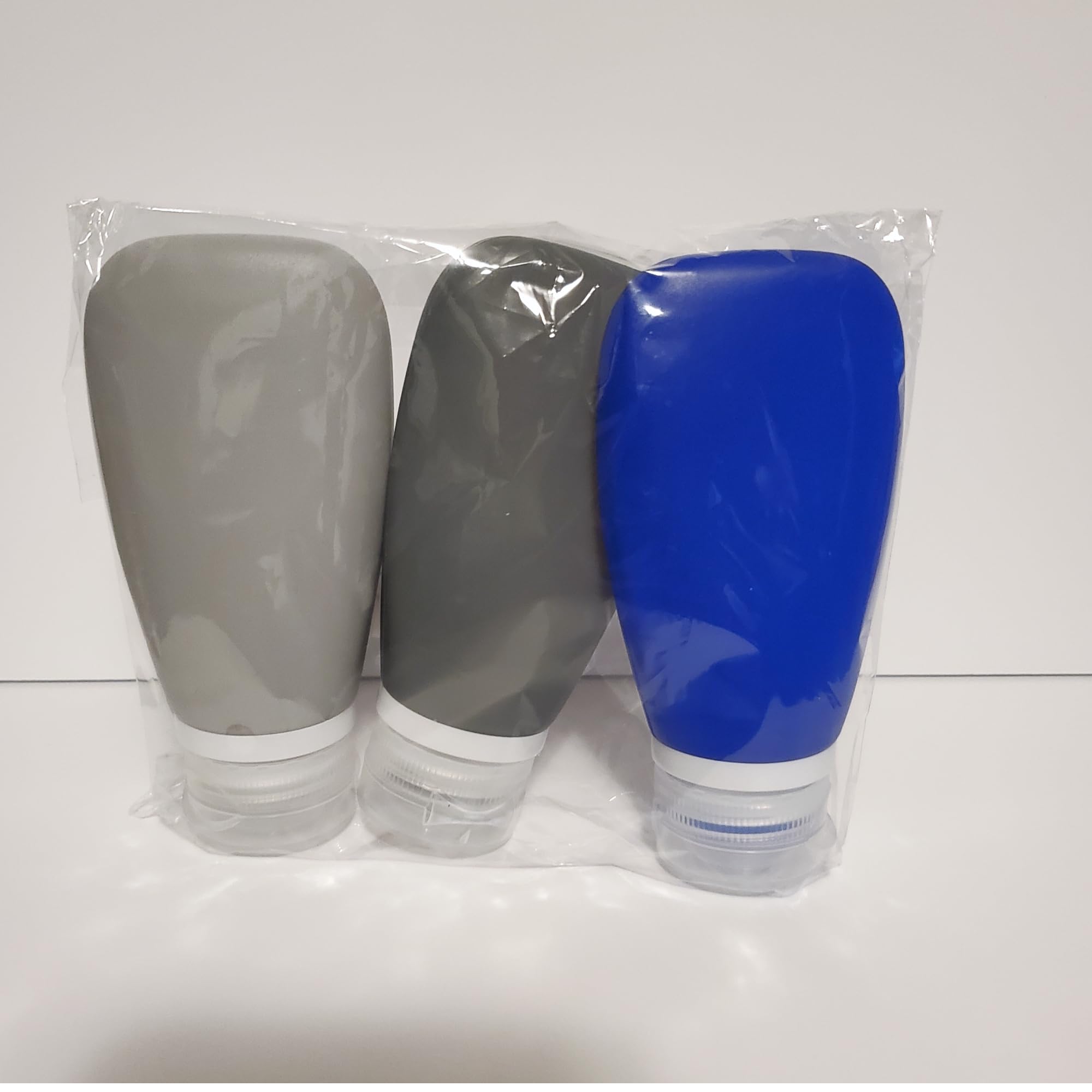 **3oz Leakproof Silicone Travel Bottles Set - TSA Approved Refillable Toiletries Containers for Shampoo, Lotion & More (Black, Gray, Blue) - Perfect for Airplane Travel, Gym & Outdoor Adventures**