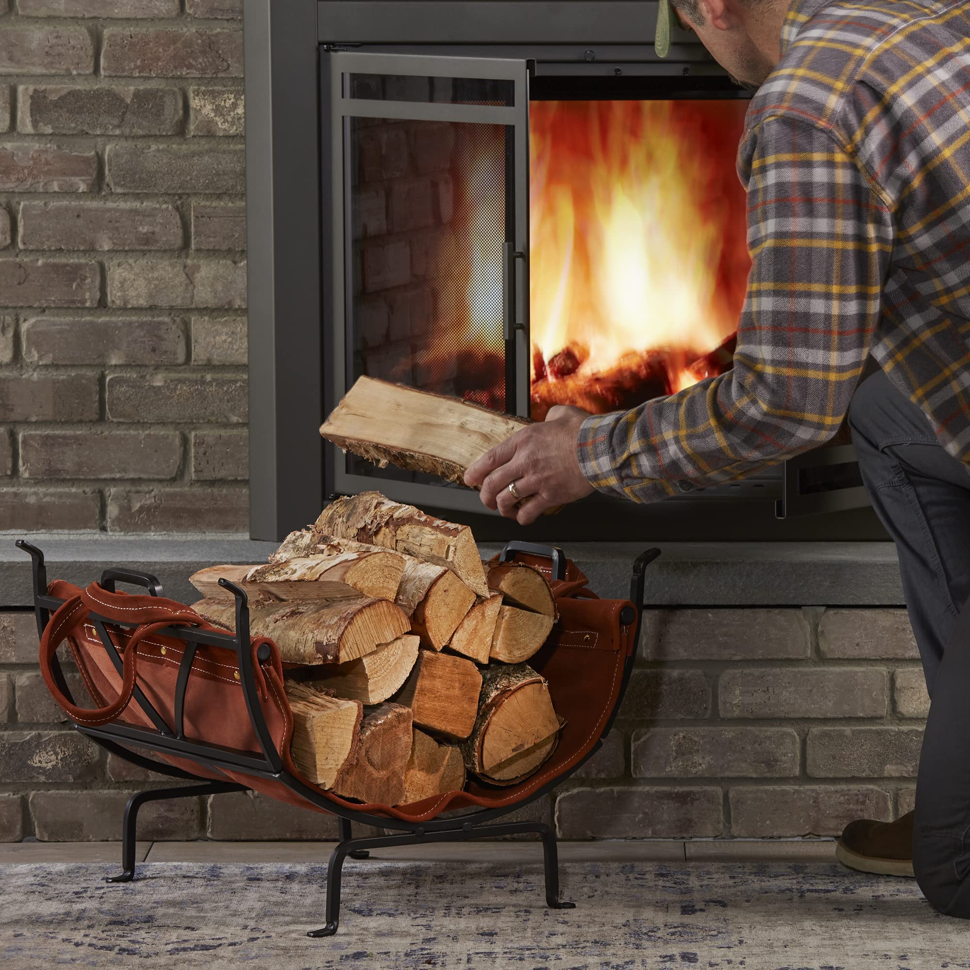 UniFlame Black Wrought Iron Firewood Log Holder with Leather Carrier - Outdoor Firewood Storage for Fireplace, Camping, and Patio Use