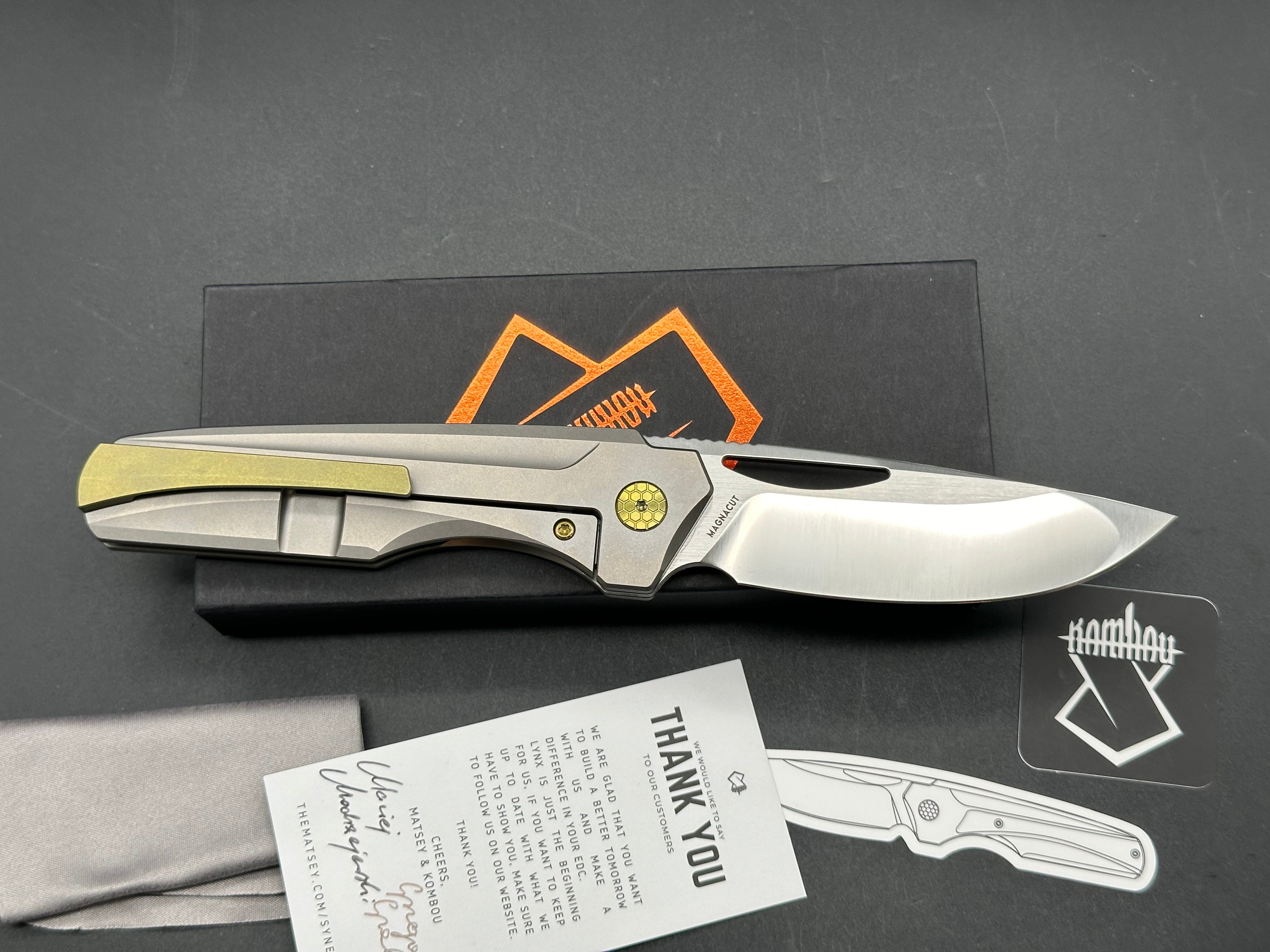 Premium Lynx Grey Titanium Handle Folding Knife with Gold Marble Carbon Fiber & Gold Anodized Accents - Drop Point Satin Mangnacut Blade - EDC, Outdoor, Camping, Hunting & Survival Gear