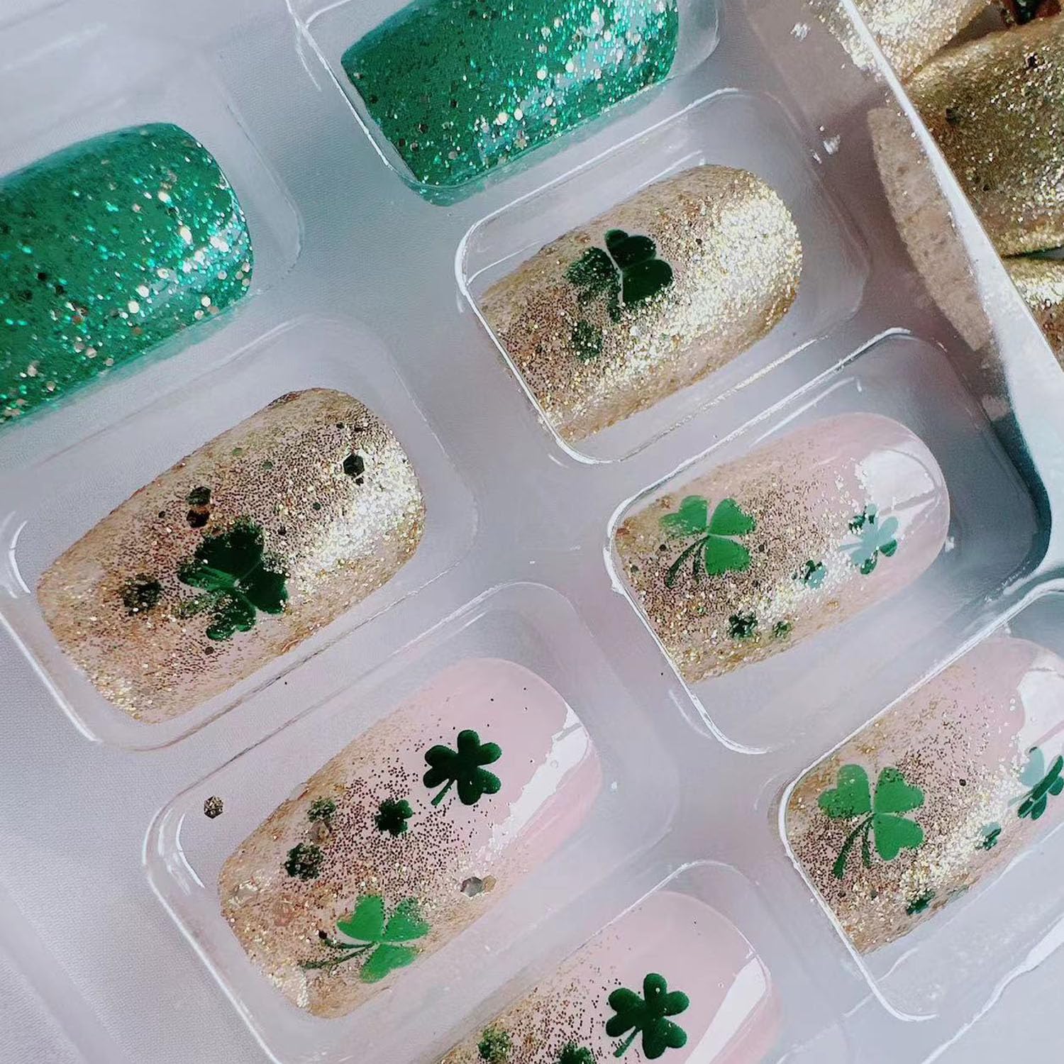 St. Patrick's Day Press On Nails - Medium Coffin Fake Nails with Lucky Clover Design, Green Gold Glitter & French Tips | 24Pcs Shamrock Glitter Full Cover Artificial Nails for Women | Perfect for Parties, Festivals & Irish Celebrations