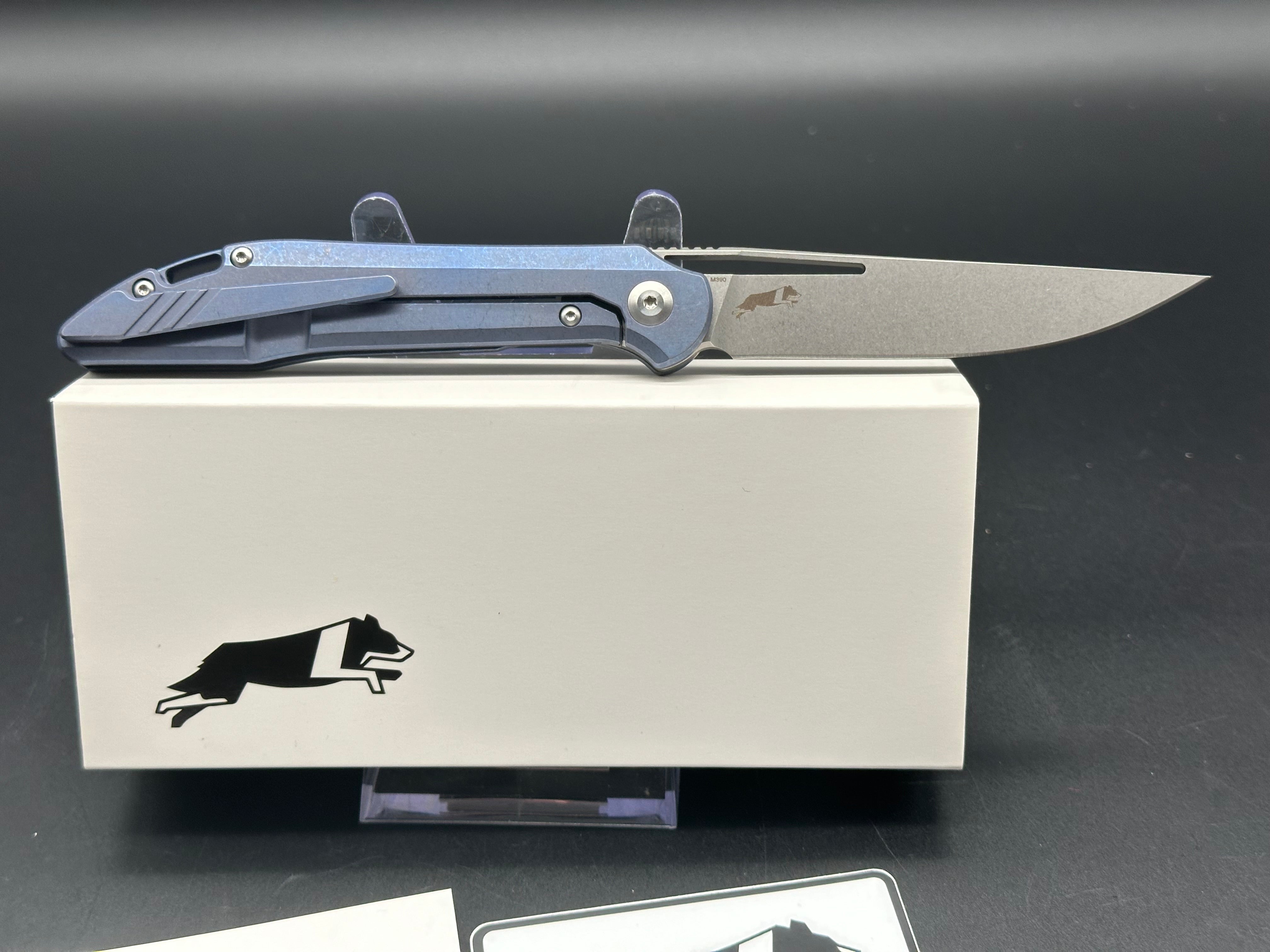 Boos Blades Smoke TM1 Folding Knife - M390 Stonewashed Blade, Arctic Blue Titanium Scales - EDC Pocket Knife for Outdoor, Camping & Everyday Carry
