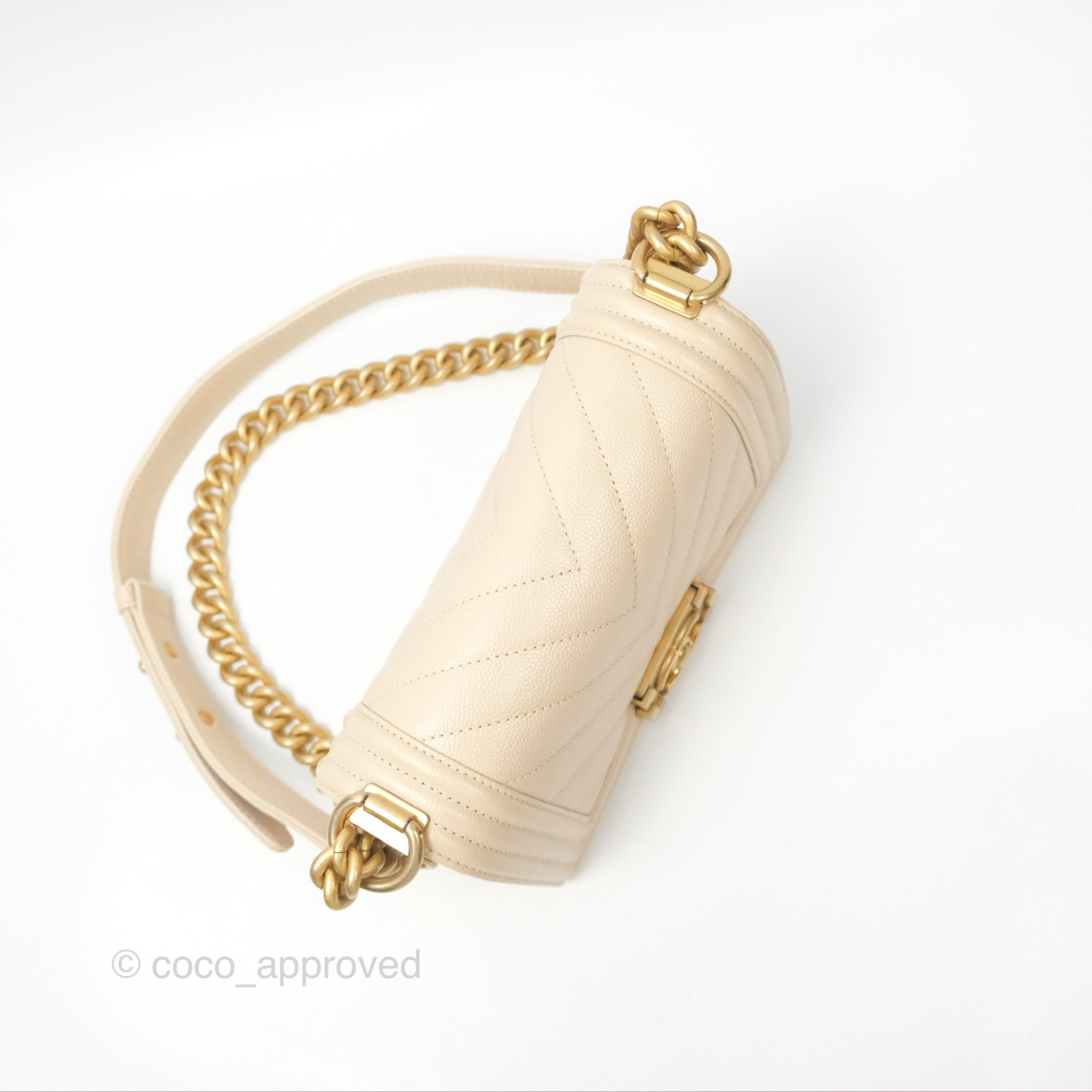 Chanel Chevron Small Boy Bag in Cream Ivory Caviar Leather with Aged Gold Hardware - Perfect for Luxury Fashion & Everyday Elegance