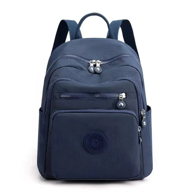 Waterproof Nylon Women's Travel Backpack - Lightweight Carry On Backpack for Airplane, Hiking & Outdoor Adventures