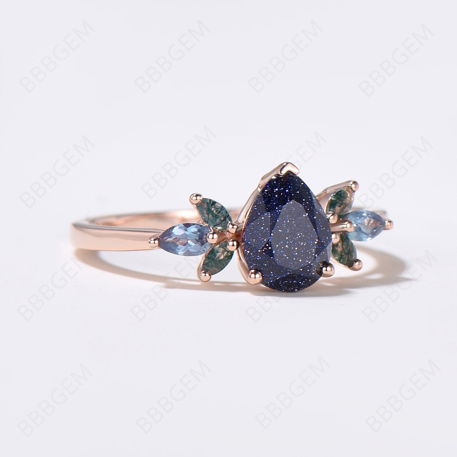 1.25ct Pear Shaped Blue Sandstone Engagement Ring - 7 Stone Moss Agate Cluster Wedding Band in Rose Gold - Blue Goldstone Promise Ring for Women - Perfect for Proposals, Anniversaries & Special Occasions
