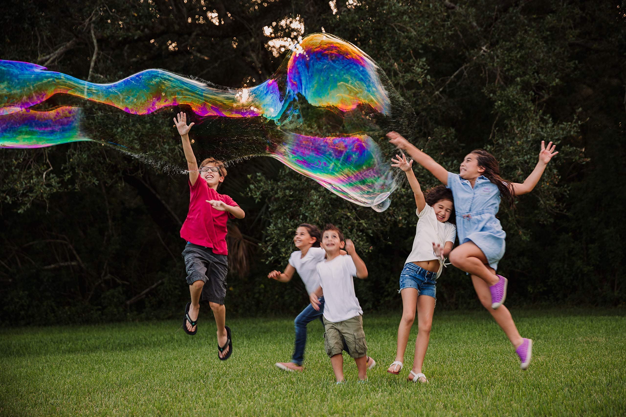 WOWMAZING Unicorn Giant Bubbles Kit with Wand, 7 Bubble Concentrate Pouches & 8 Sun-Activated Stickers | Outdoor Bubble Toy for Kids & Birthday Parties | Made in USA | Perfect for Backyard Fun, Summer Activities & Family Gatherings
