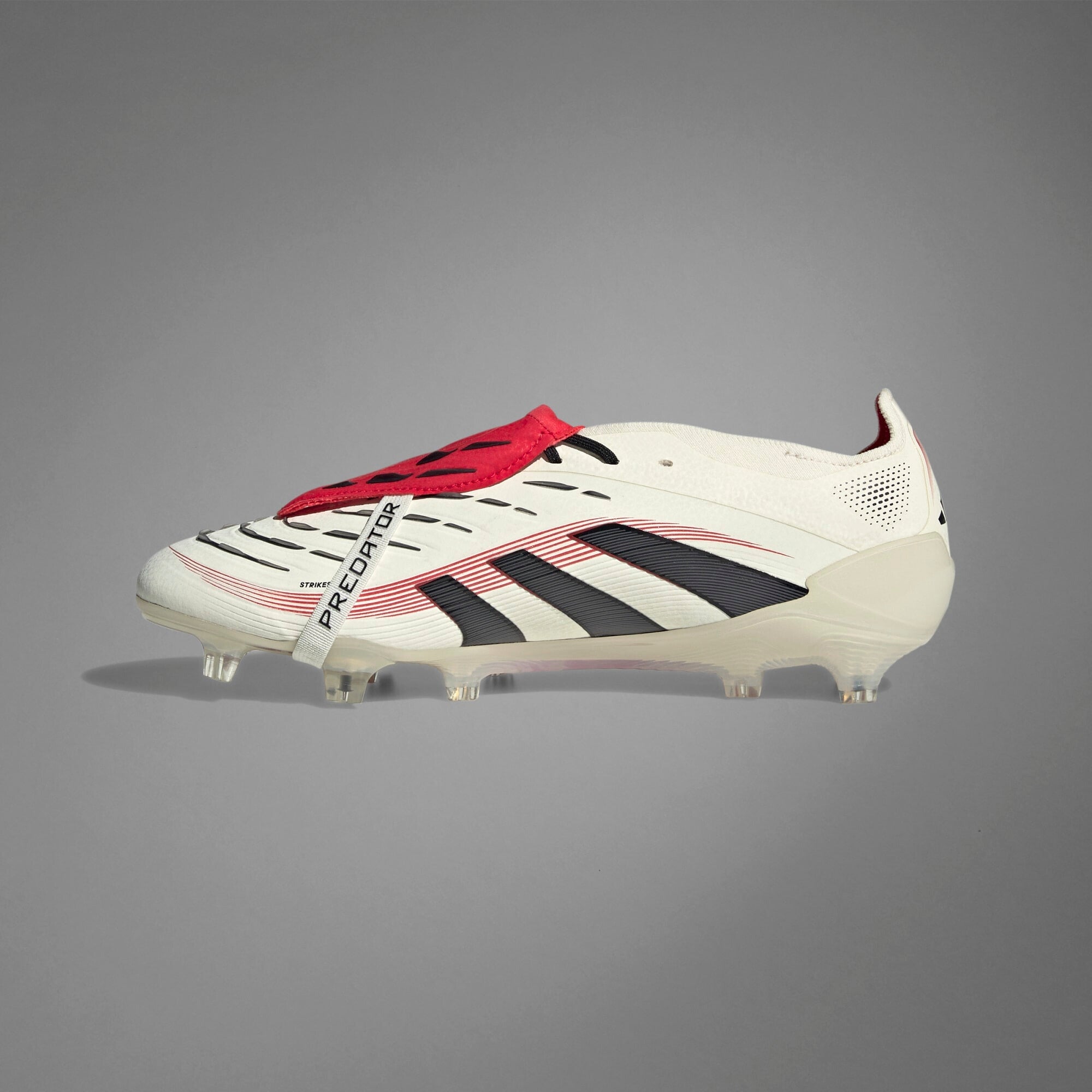 **adidas Predator Elite Fold Over Tongue Soccer Cleats - Lightweight & Comfortable for Football Training & Matches**    *(Use Case: Perfect for competitive soccer players seeking superior traction and support on firm ground surfaces.)*