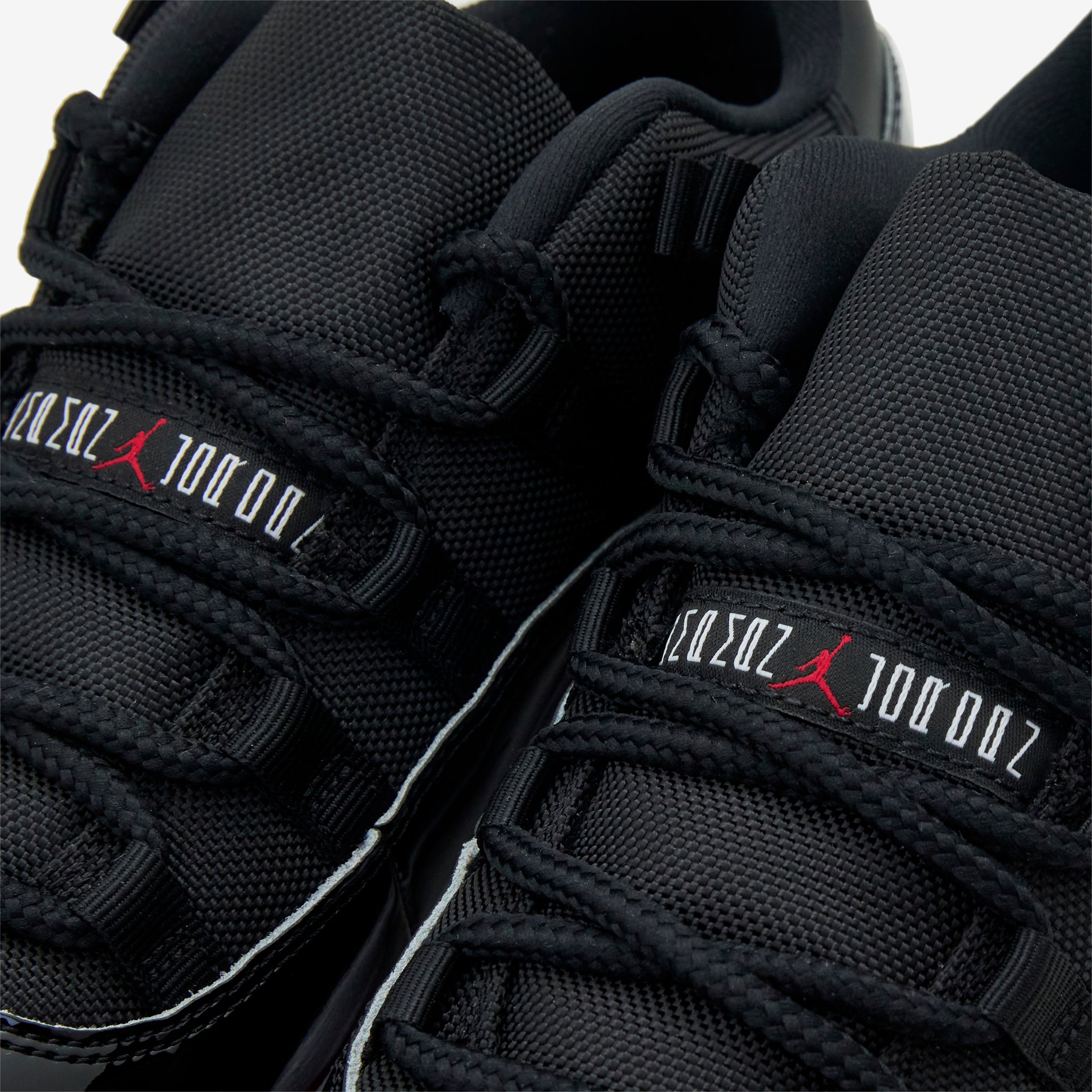 Air Jordan 11 Retro Low 'Bred' Men's Basketball Shoes - Black/Varsity Red/White | Classic Sneakers for Streetwear & Court Performance