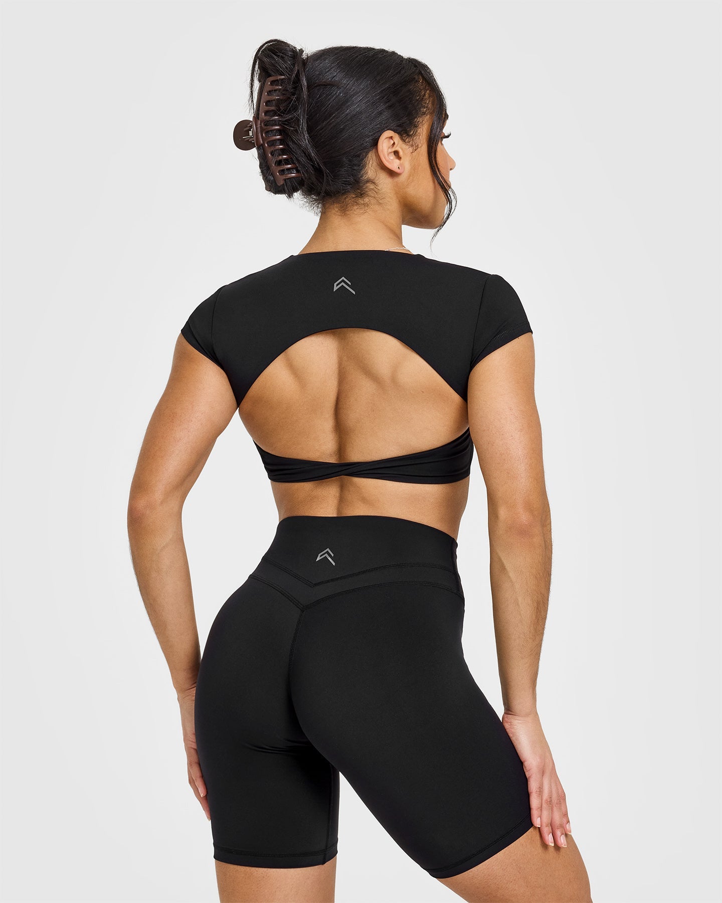 Trendy Twist Front Short Sleeve Crop Top for Women | Black | Perfect for Summer Outfits, Beach Vacations & Casual Wear