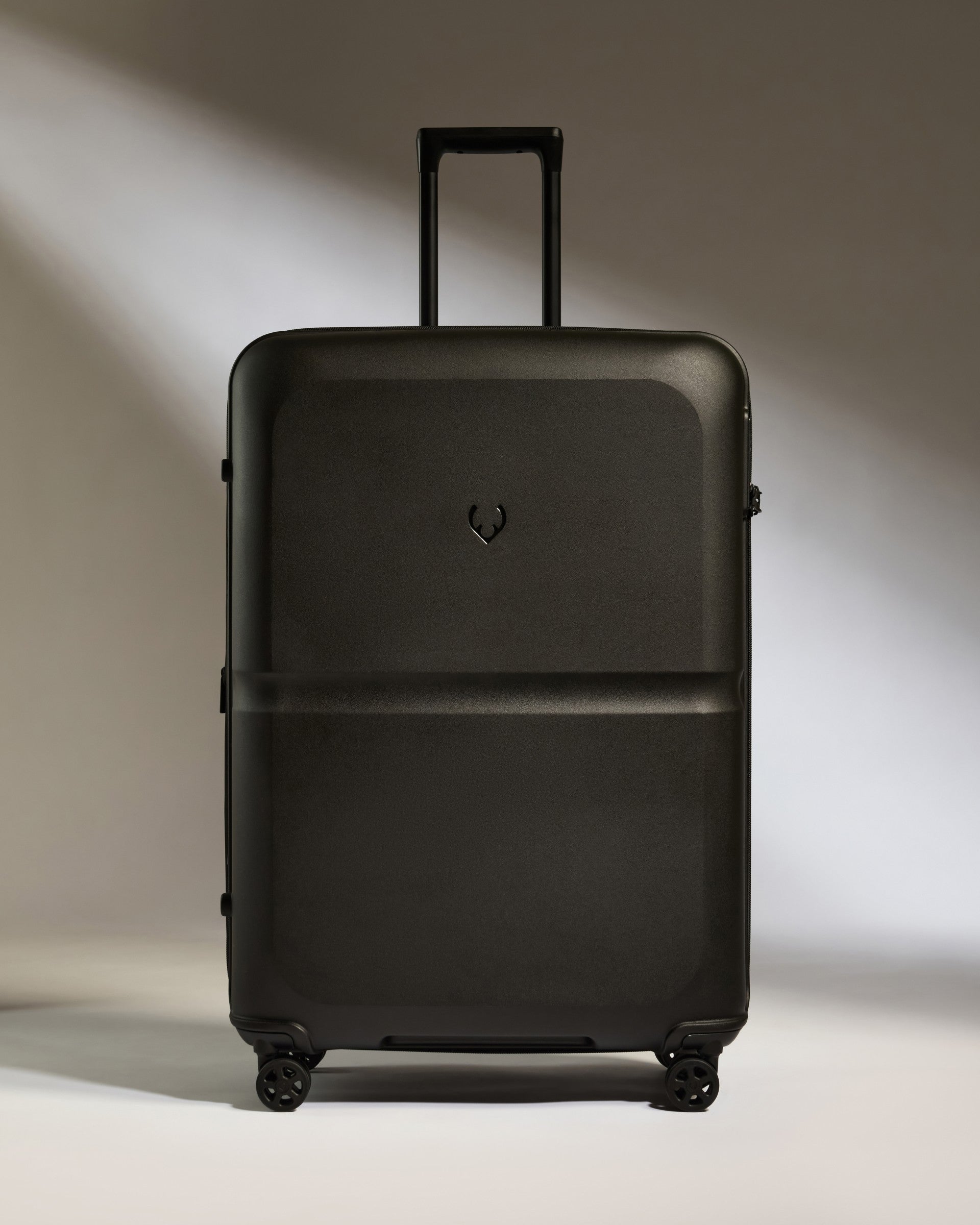 Large Black Luggage with Single Stripe - Spacious Travel Suitcase for Business Trips & Vacations