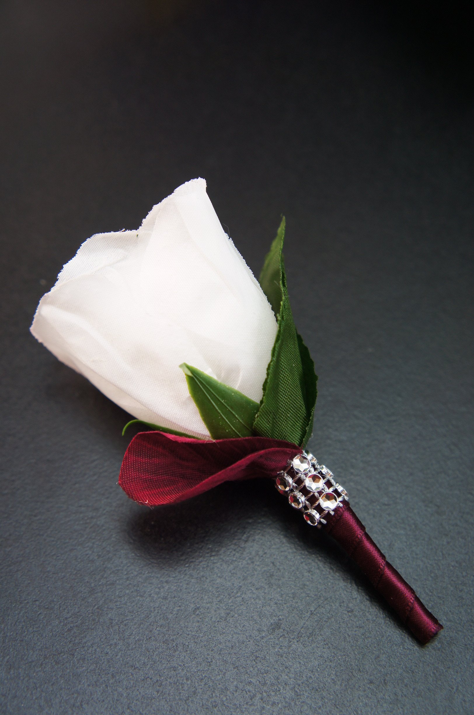 Angel Isabella Boutonniere - Elegant White Rose with Burgundy Accents, Wedding Corsage for Prom, Homecoming & Formal Events - Handcrafted Floral Boutonniere with Burgundy Ribbon Stem