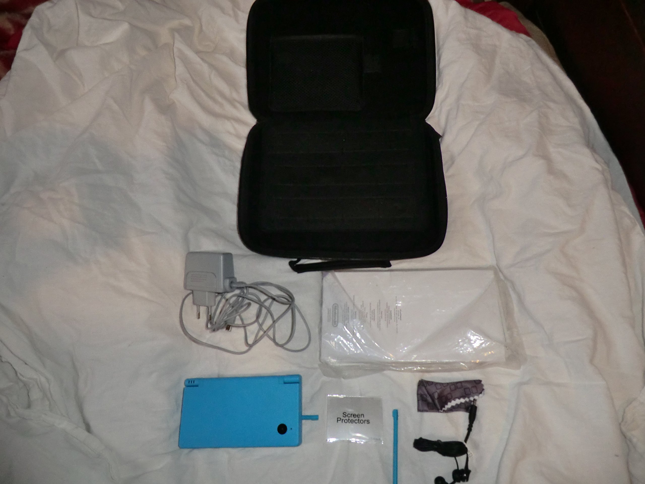 Nintendo DSi Console - Light Blue | Portable Gaming System for Kids & Adults | Play Anytime, Anywhere
