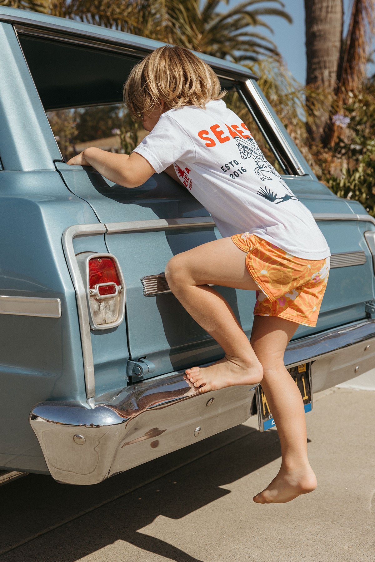 Surf Cowboy Graphic T-Shirt for Youth & Juniors - Soft Coconut Color - Perfect for Beach Outings & Casual Wear